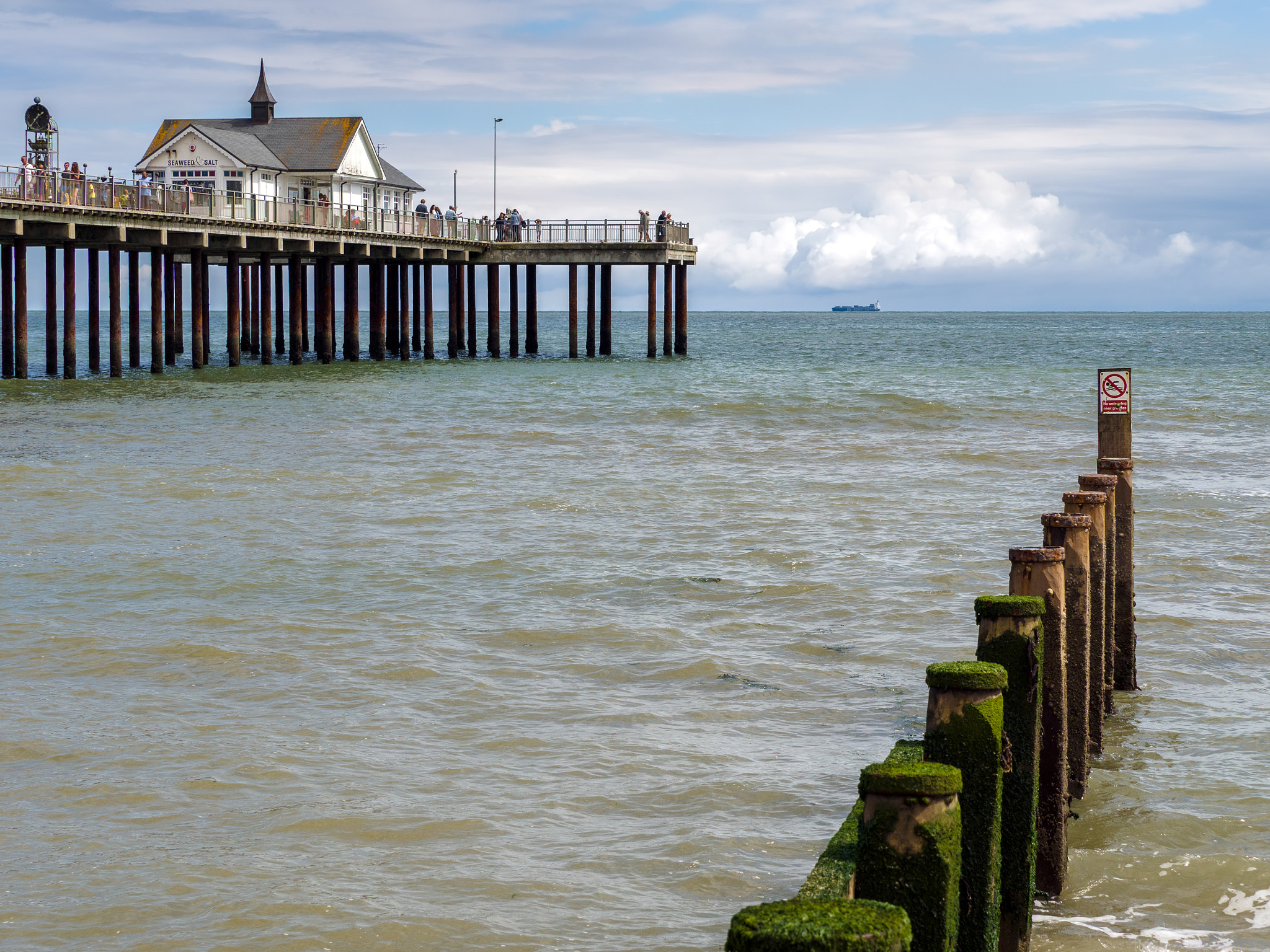 People Enjoying a Sunny Day Out on Southwold Pier