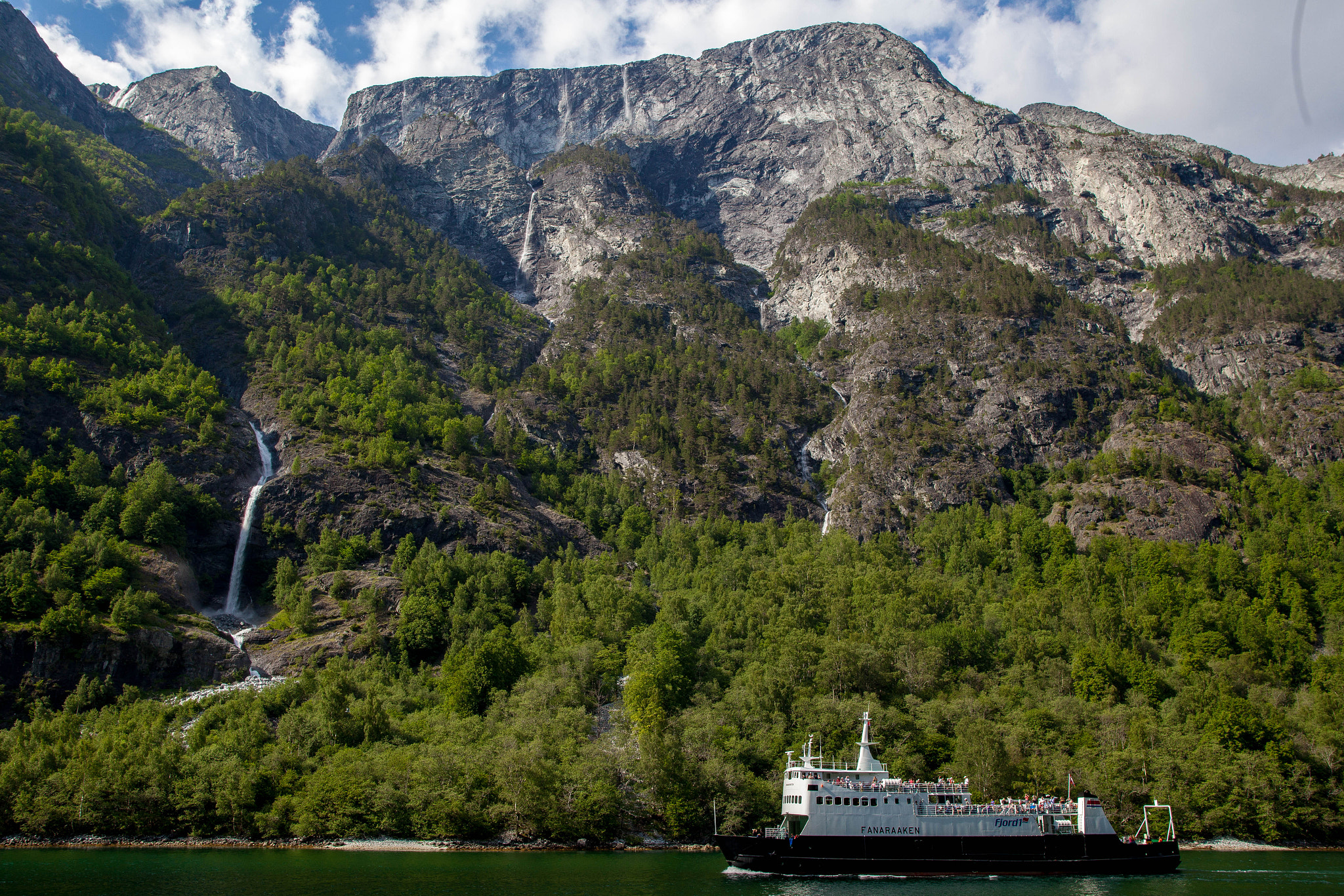 Sigma 28mm f/1.8 DG Macro EX sample photo. Ferry in fjord photography