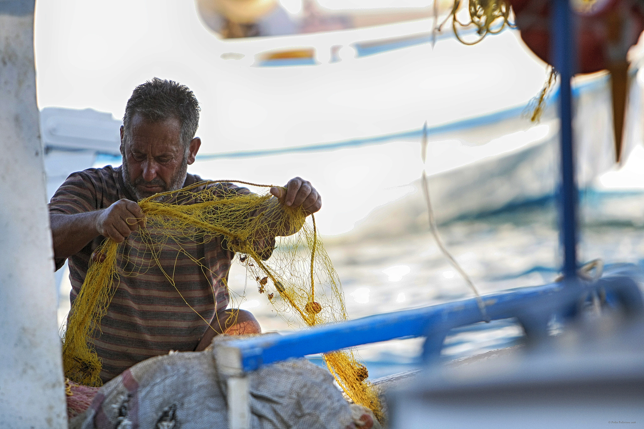 Canon EF 70-200mm F2.8L IS USM sample photo. Fisherman at skiathos photography