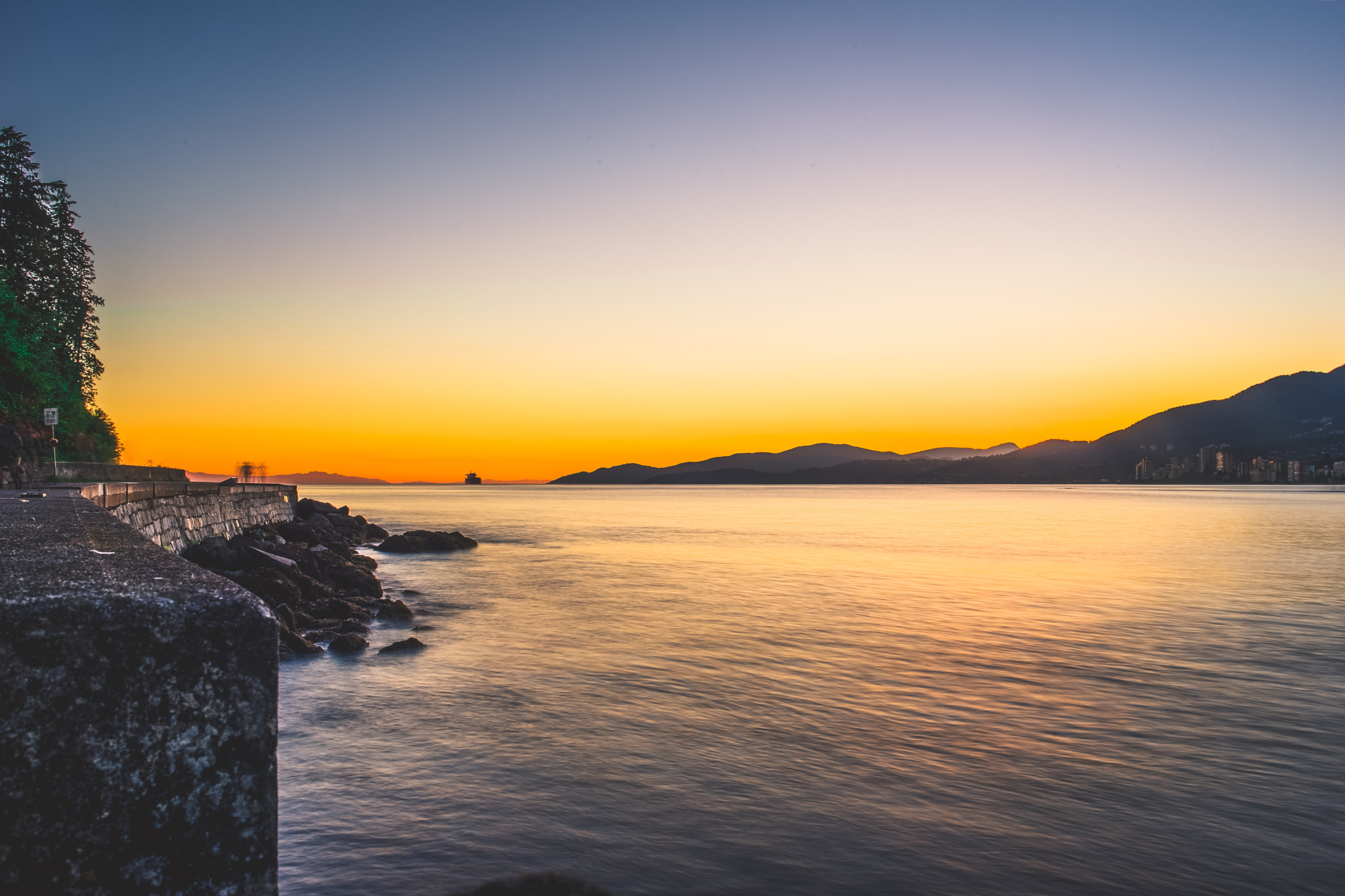 Sony a7 sample photo. Sunset seawall stroll photography