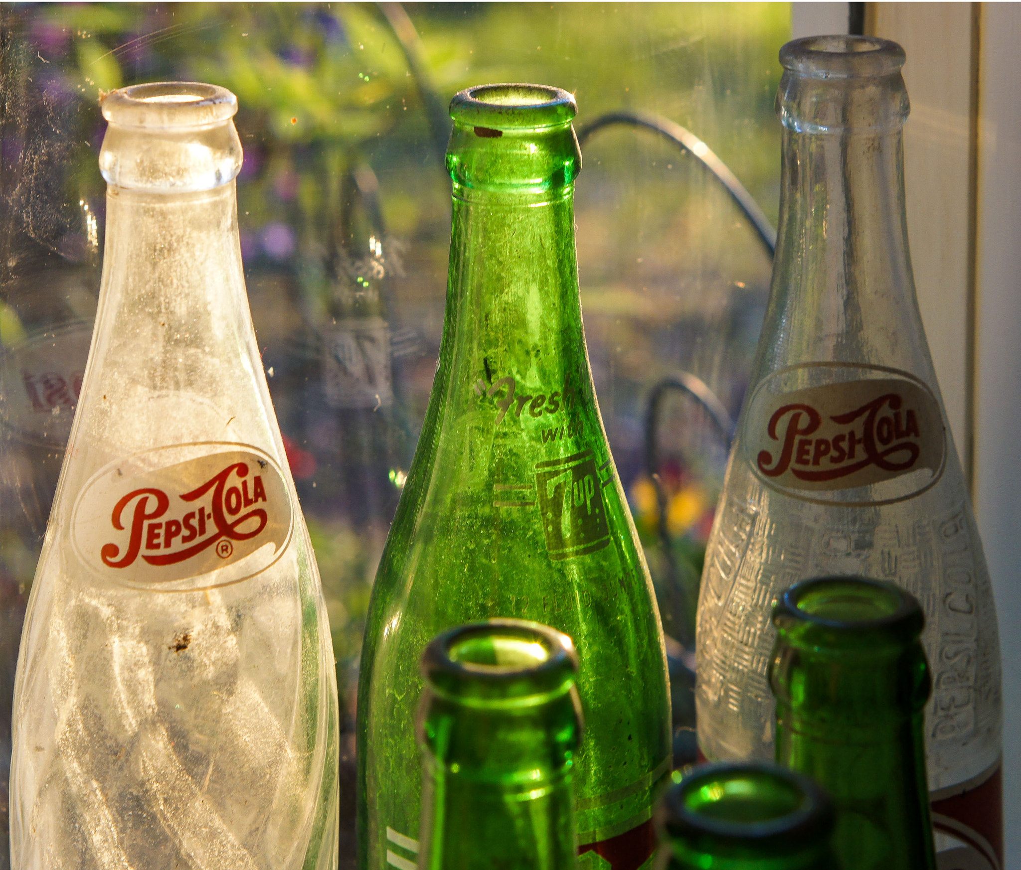 Sony Alpha NEX-5 + E 50mm F1.8 OSS sample photo. Antique soda bottles photography