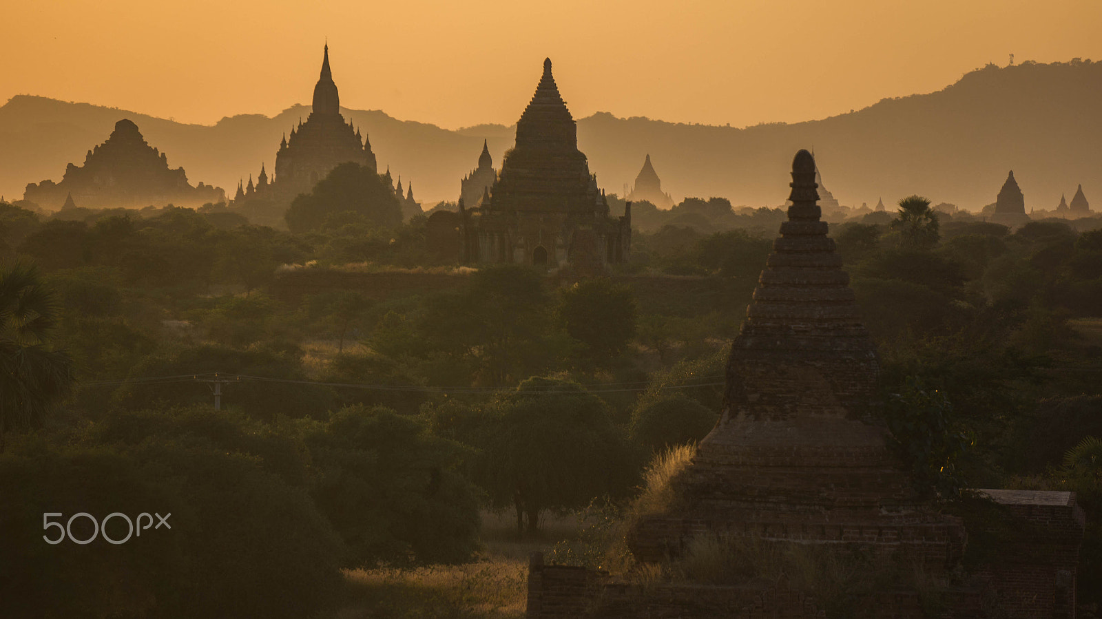 Sony Alpha NEX-5N + Sony E 55-210mm F4.5-6.3 OSS sample photo. Sunset over bagan, myanmar photography