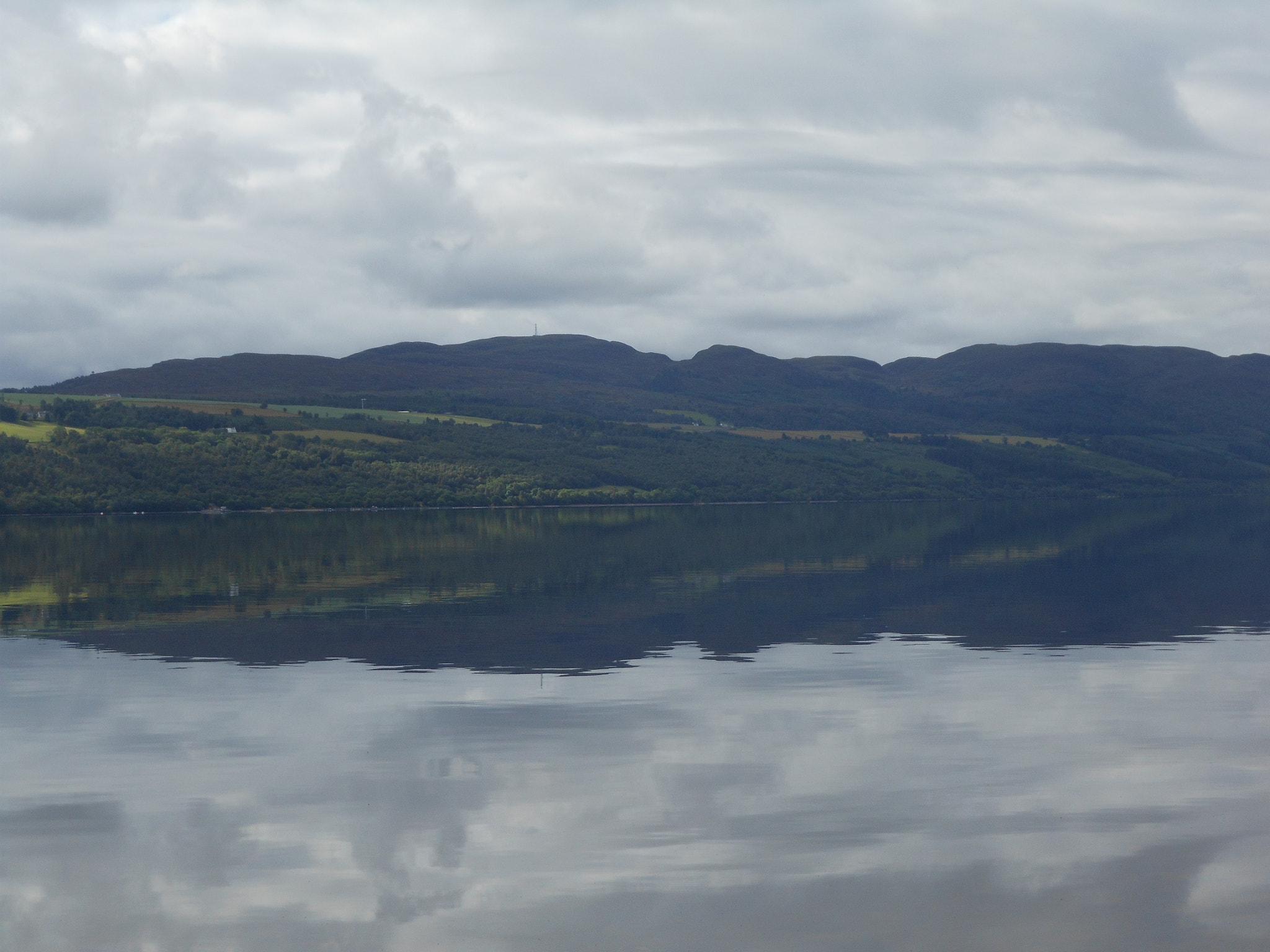 Nikon Coolpix S6100 sample photo. Clouds in a mirror. photography