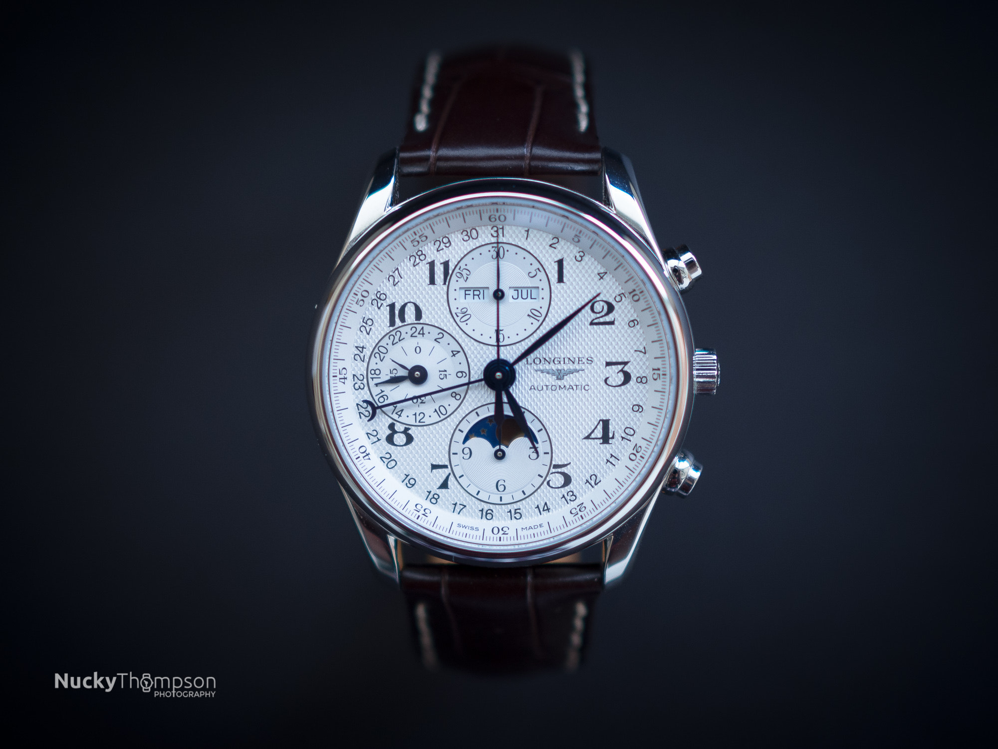 Olympus M.Zuiko Digital 25mm F1.8 sample photo. Longines moonphase chronograph watch photography