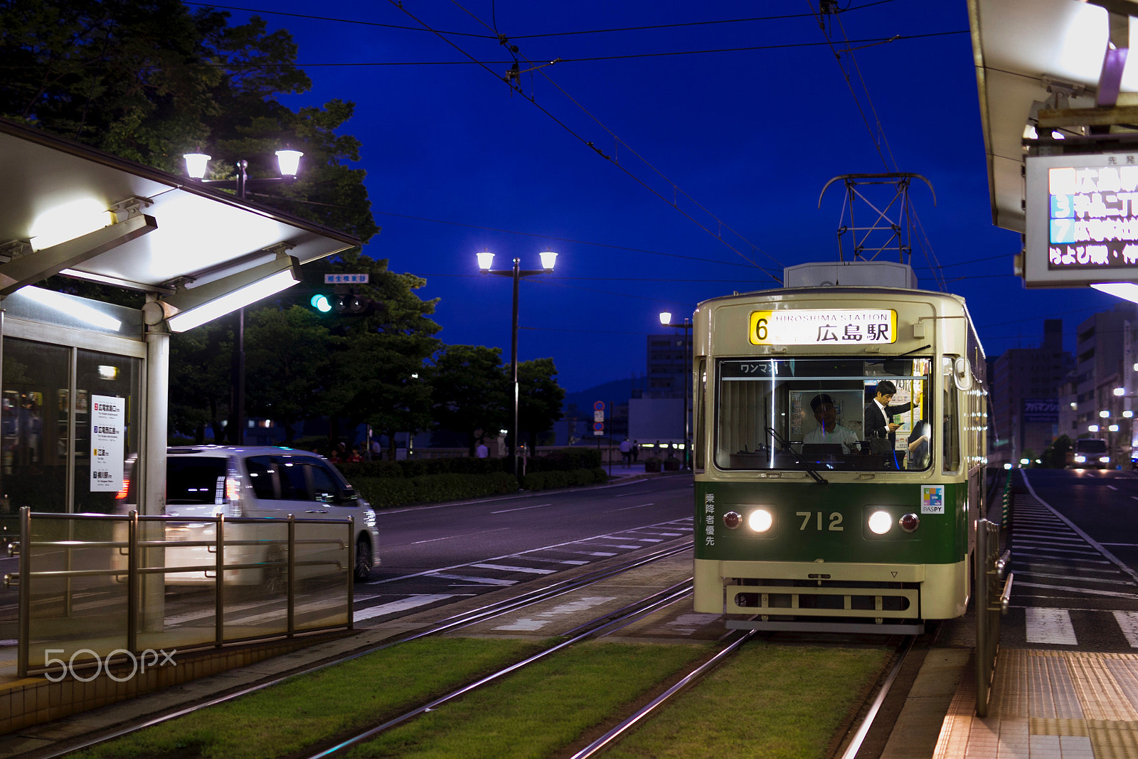 Canon EOS-1D X + Sigma 50mm F1.4 EX DG HSM sample photo. The tram runs through the night photography