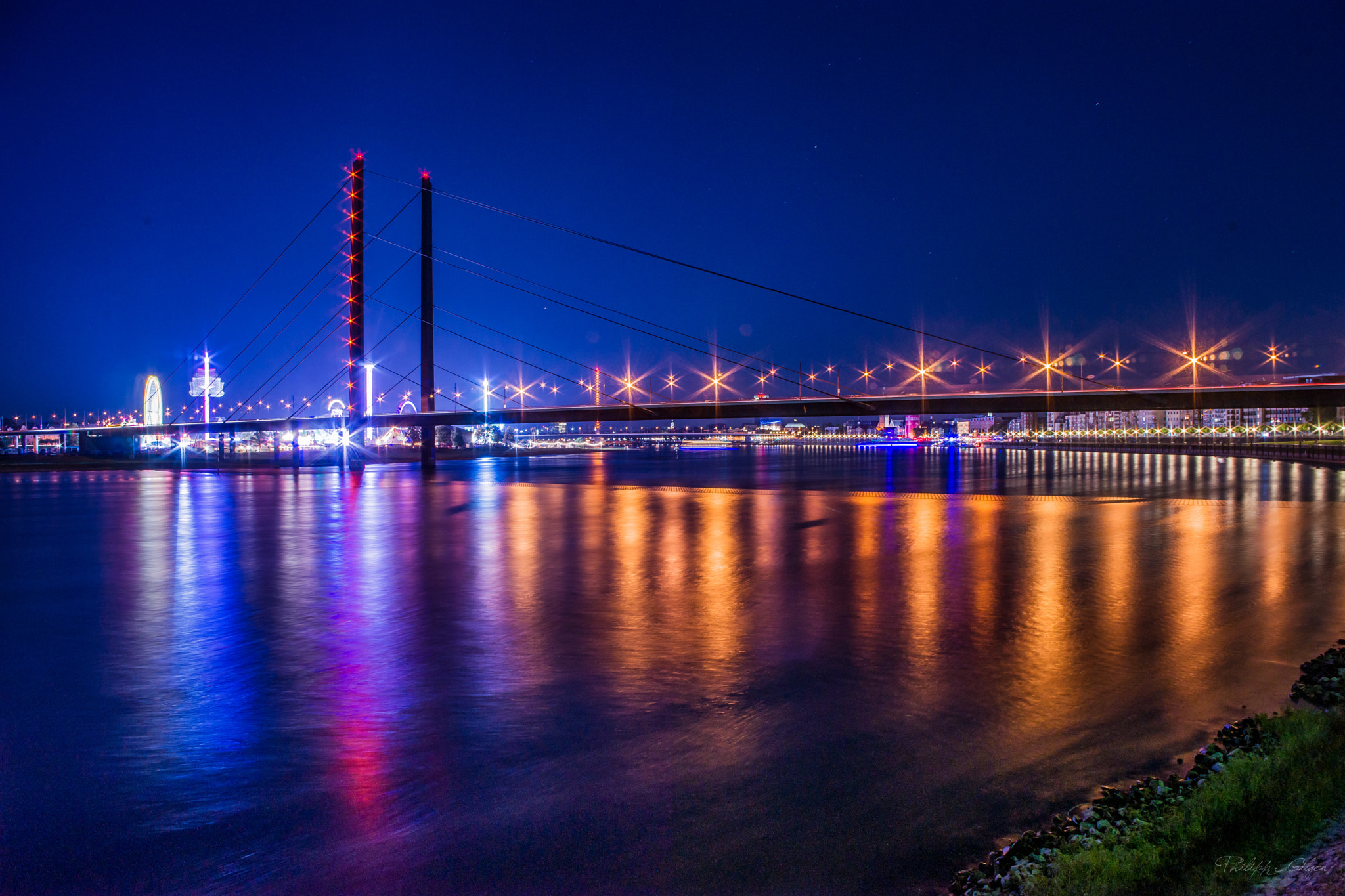 Minolta AF 24mm F2.8 sample photo. Bridge and carnival photography