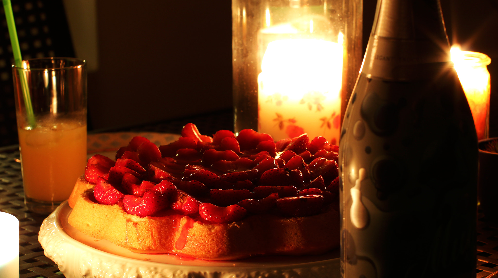 Canon EOS 70D + Canon EF 50mm F1.2L USM sample photo. Candlelight cake and champagne photography