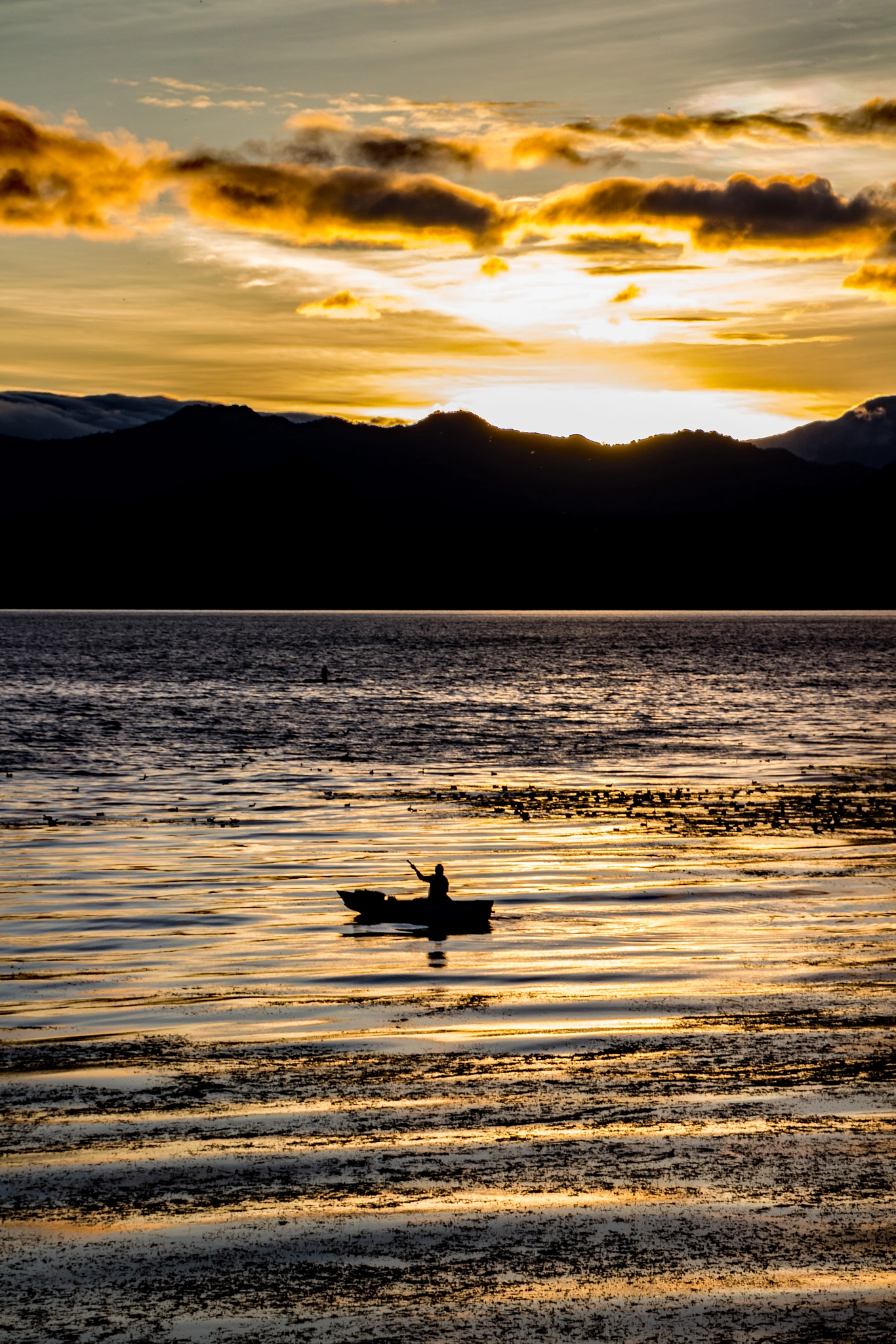 Canon EOS 100D (EOS Rebel SL1 / EOS Kiss X7) + Tamron 18-270mm F3.5-6.3 Di II VC PZD sample photo. Fishing boat at sunrise, lake atitlan, guatemala photography