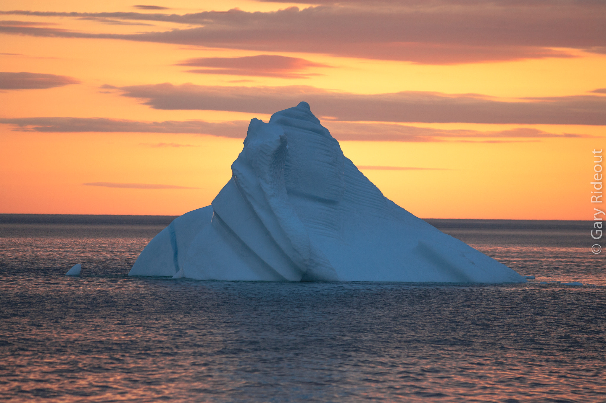 Canon EOS-1D Mark II + Canon EF 16-35mm F4L IS USM sample photo. Iceberg sitting off crow head, twilligate, newfoundland photography