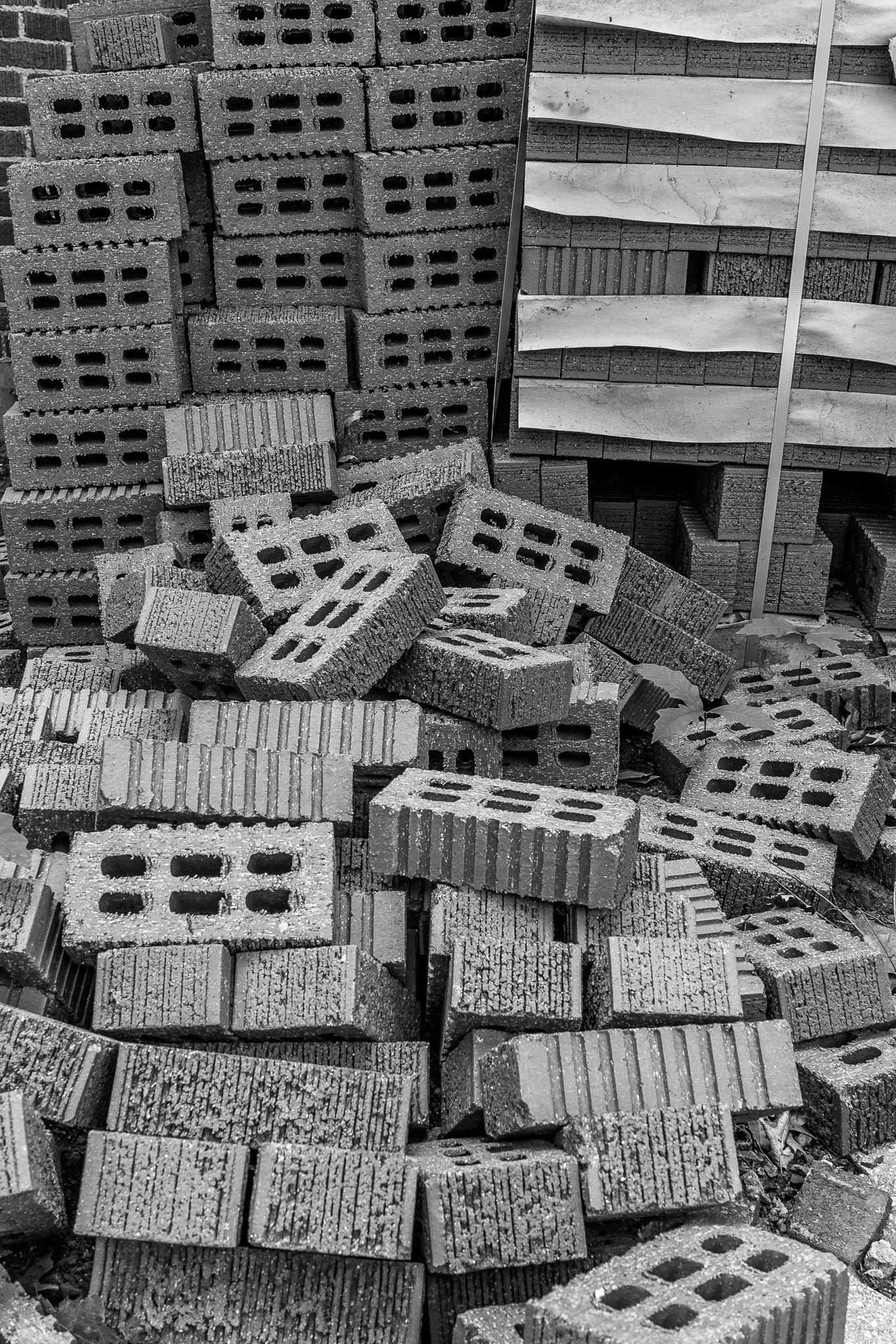 Canon EF-S 24mm F2.8 STM sample photo. Bricks, stacked and piled photography