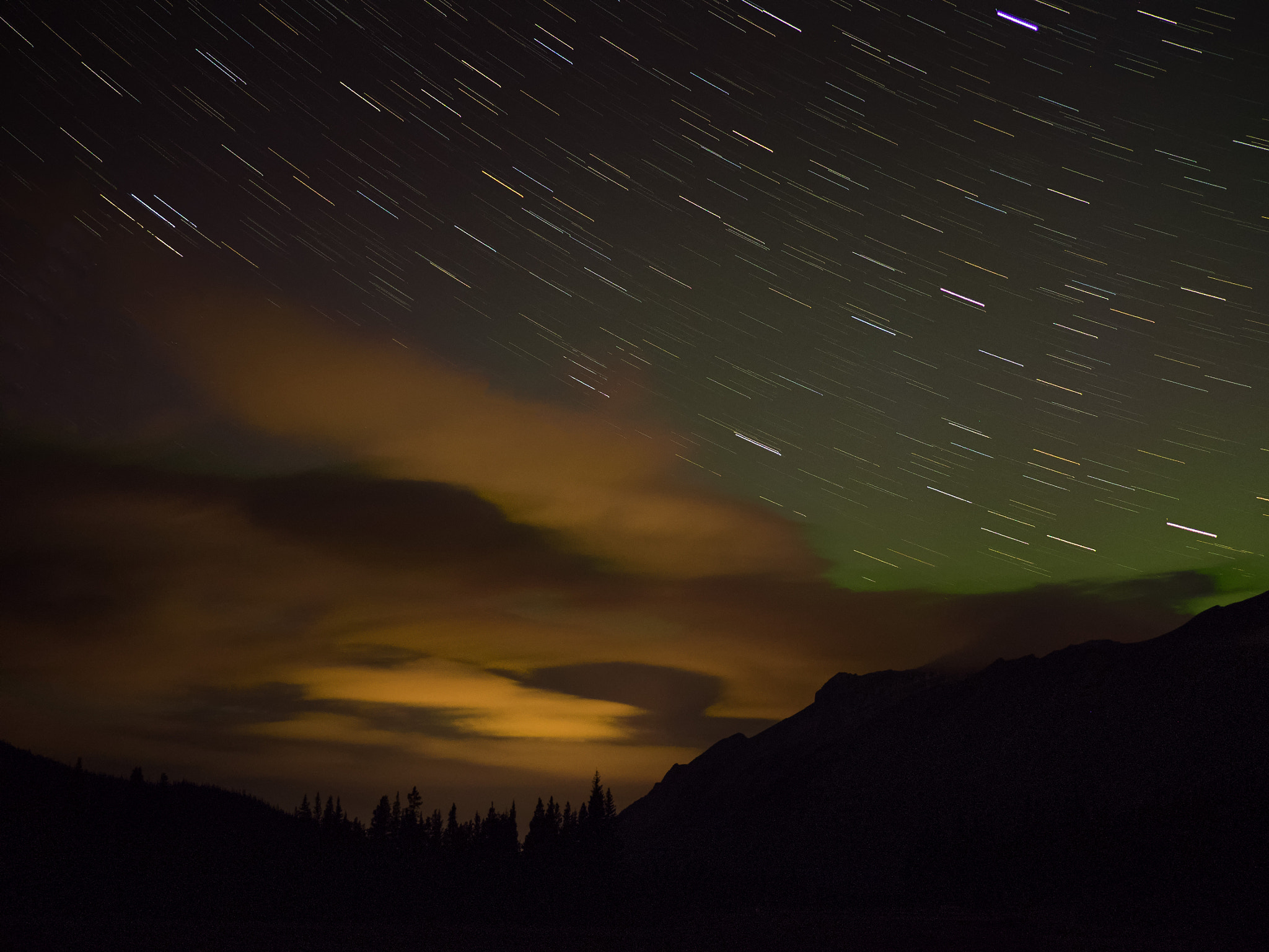 Panasonic Lumix G X Vario 35-100mm F2.8 OIS sample photo. Aurora and star trails in the mountains photography