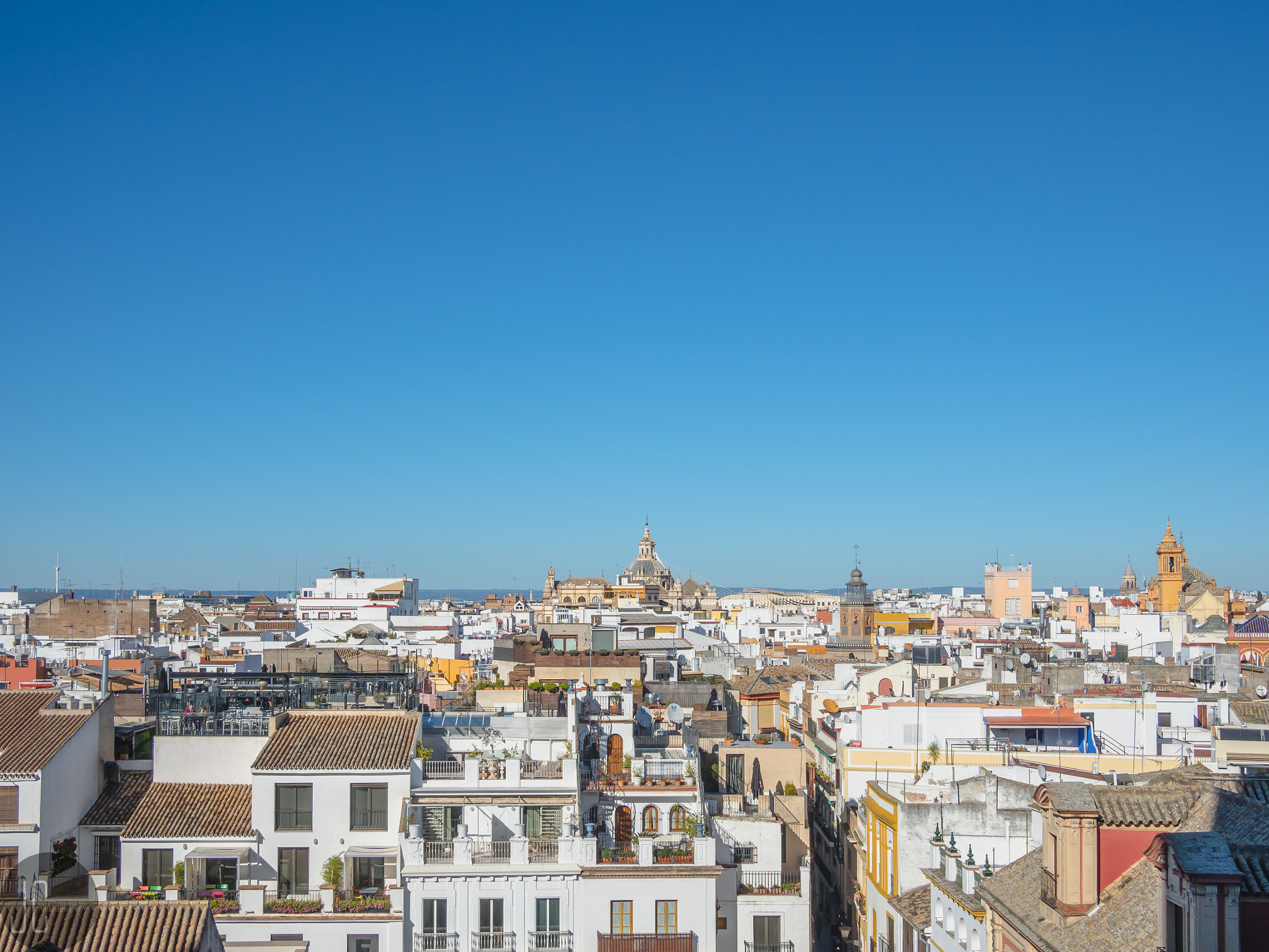 Olympus OM-D E-M5 II + Panasonic Lumix G 20mm F1.7 ASPH sample photo. Seville from cathedral photography