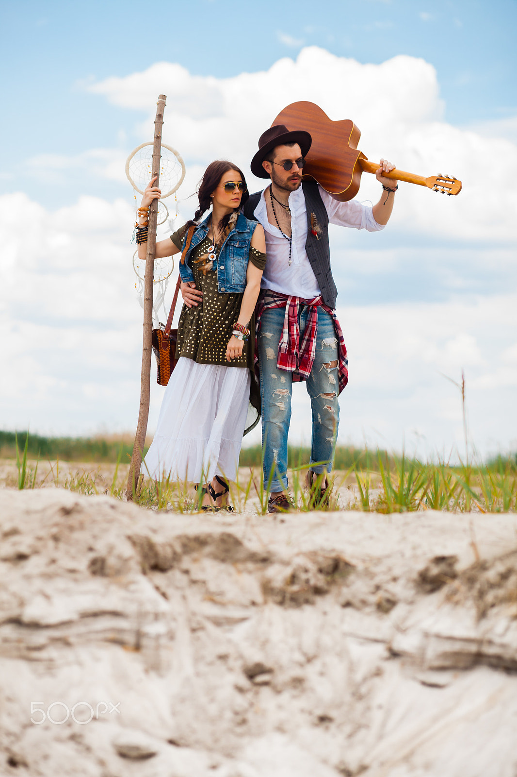 Canon EF 100mm F2.0 USM sample photo. Man and woman as boho hipsters against blue sky photography