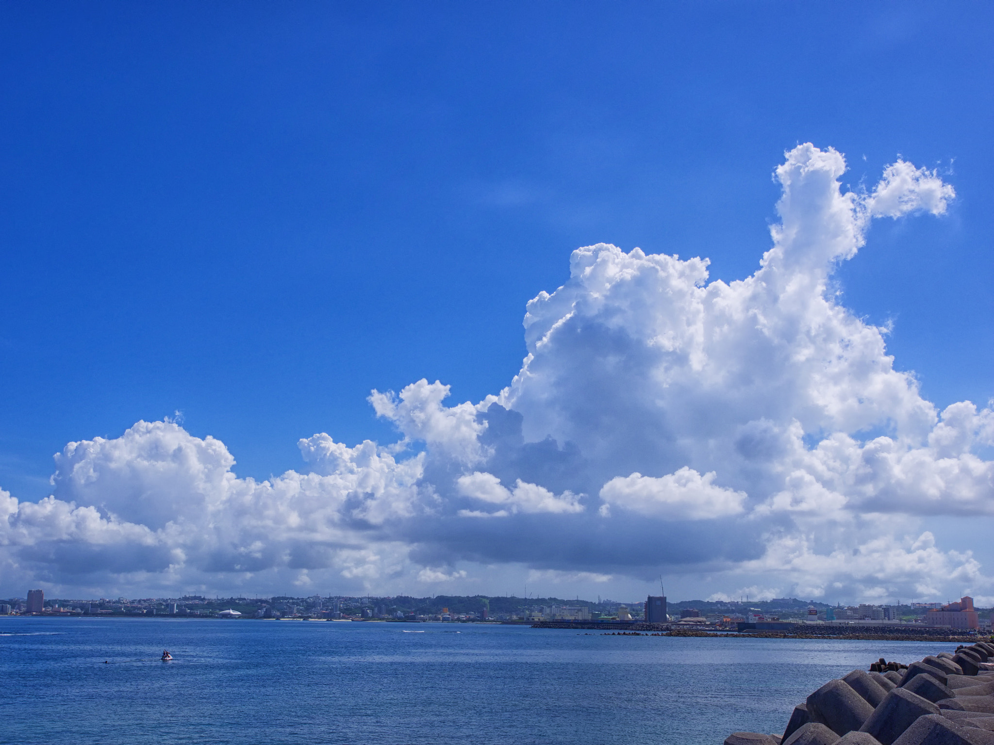 Olympus Zuiko Digital ED 12-60mm F2.8-4.0 SWD sample photo. Okinawa blue sky and thunderhead. photography