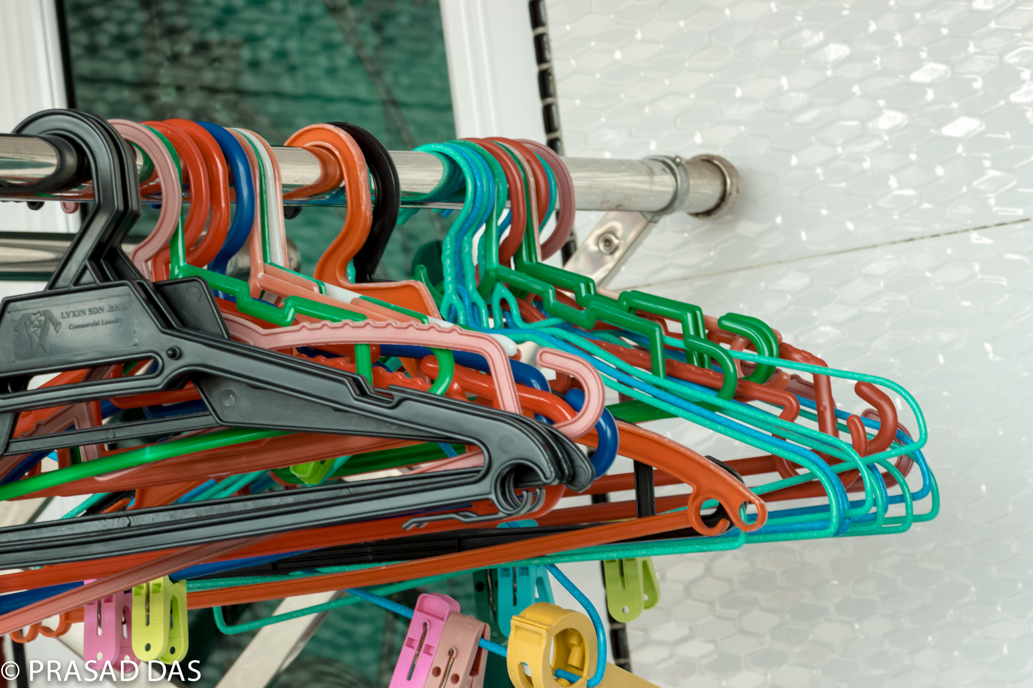 Nikon AF-S Micro-Nikkor 105mm F2.8G IF-ED VR sample photo. Hangers and pegs photography