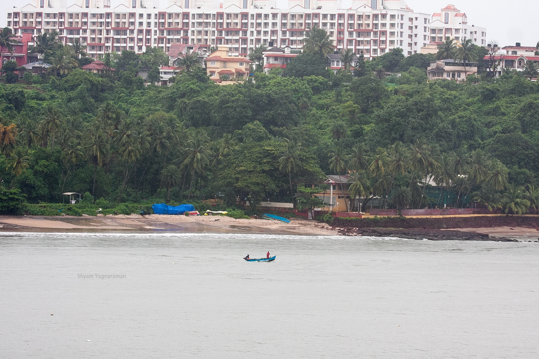 Canon EOS 40D + Canon EF 100-400mm F4.5-5.6L IS USM sample photo. The water, the green, and the buildings photography