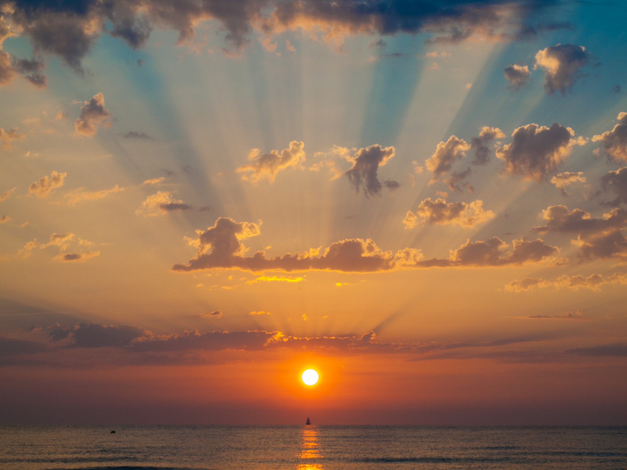 Olympus E-620 (EVOLT E-620) + OLYMPUS 14-42mm Lens sample photo. Sunrise with a sailboat photography