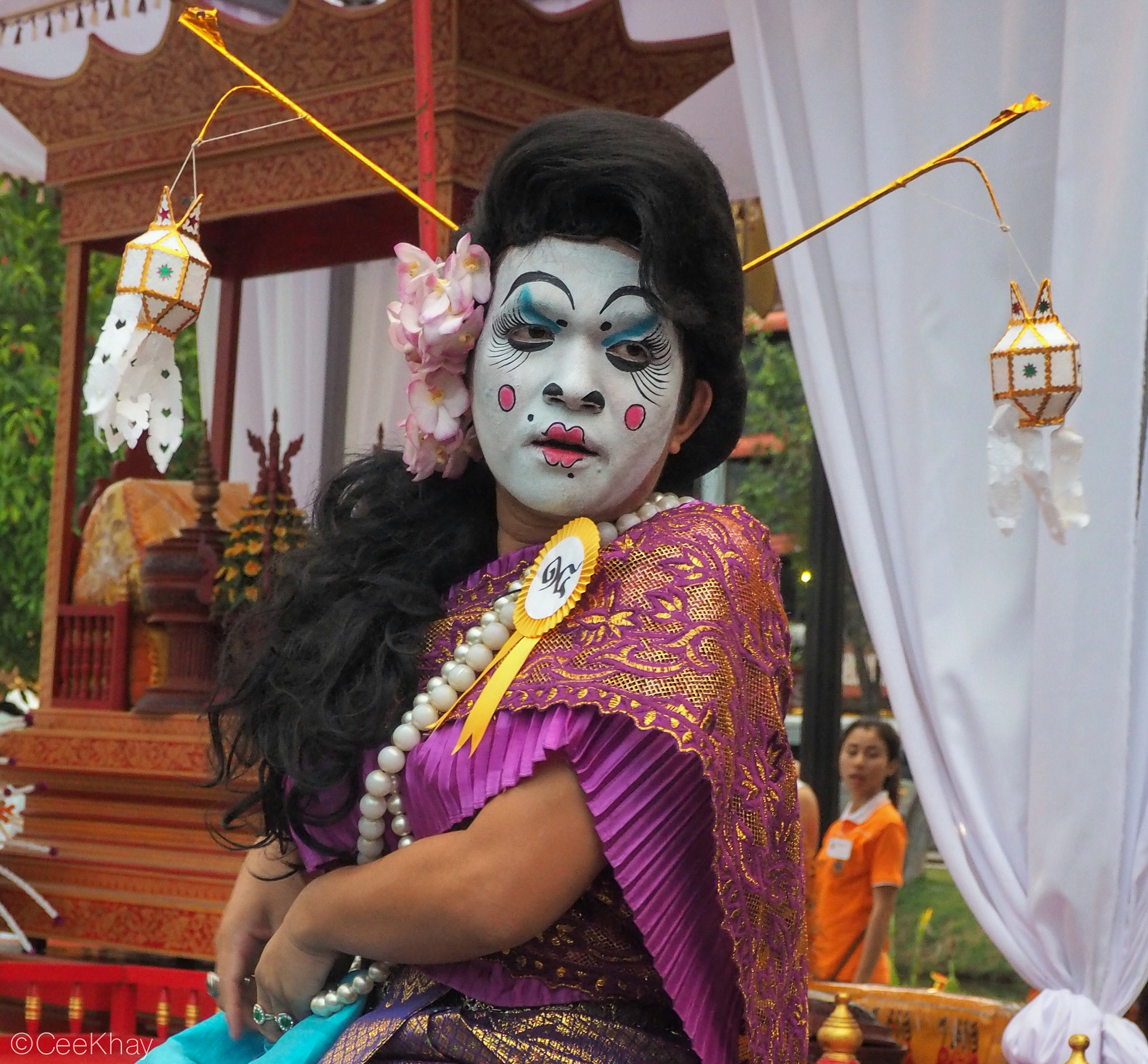 Olympus OM-D E-M10 + OLYMPUS M.12-50mm F3.5-6.3 sample photo. Masked lady at traditional thai festival photography