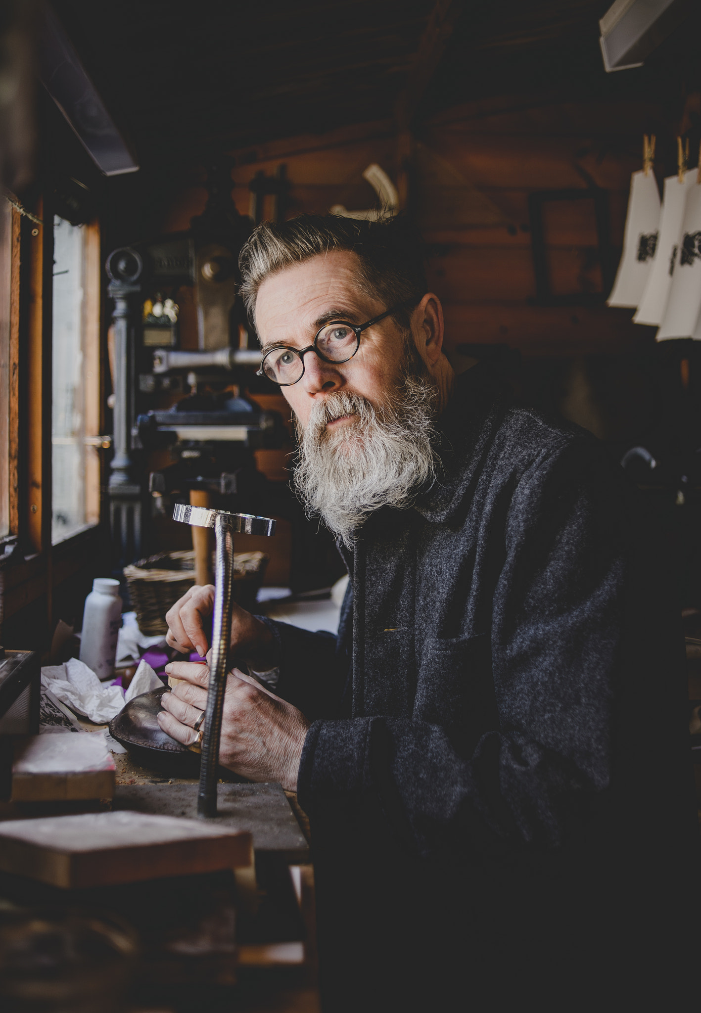 AF Nikkor 35mm f/2 sample photo. Wood engraver jonathan mercer in his west london studio. photography