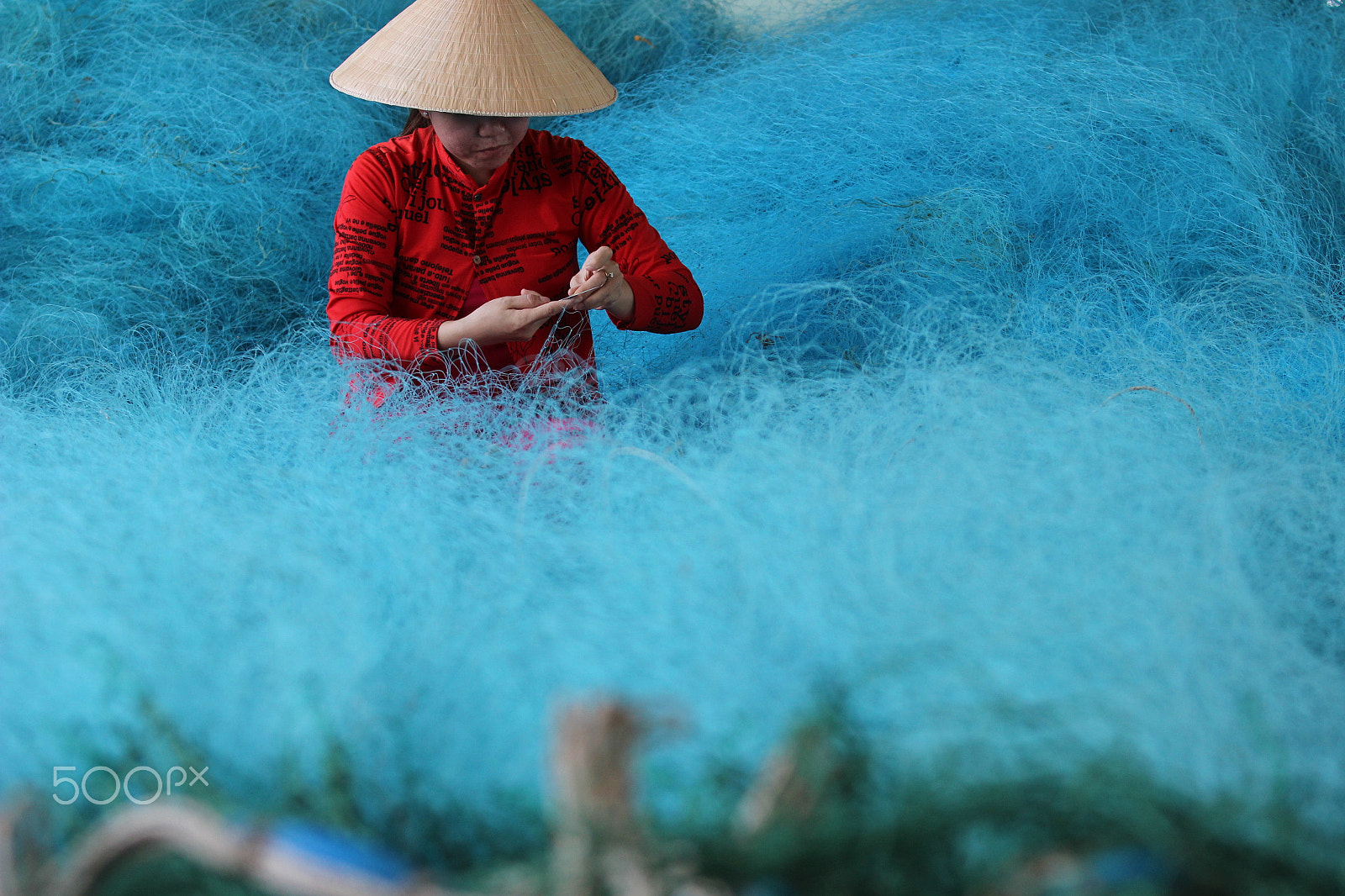Canon EF 70-200mm F2.8L USM sample photo. Fishing net's knitting photography