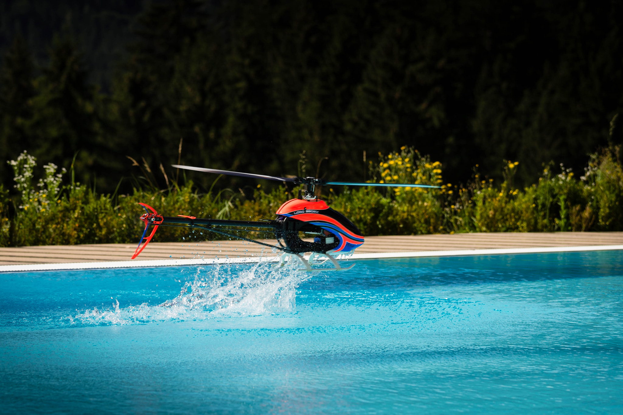 Sony a7 II + Canon EF 70-200mm F4L IS USM sample photo. Helicopter over pool photography