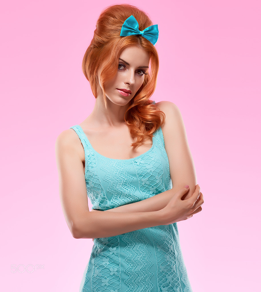 Fashion redhead model in trendy sexy dress, Pinup