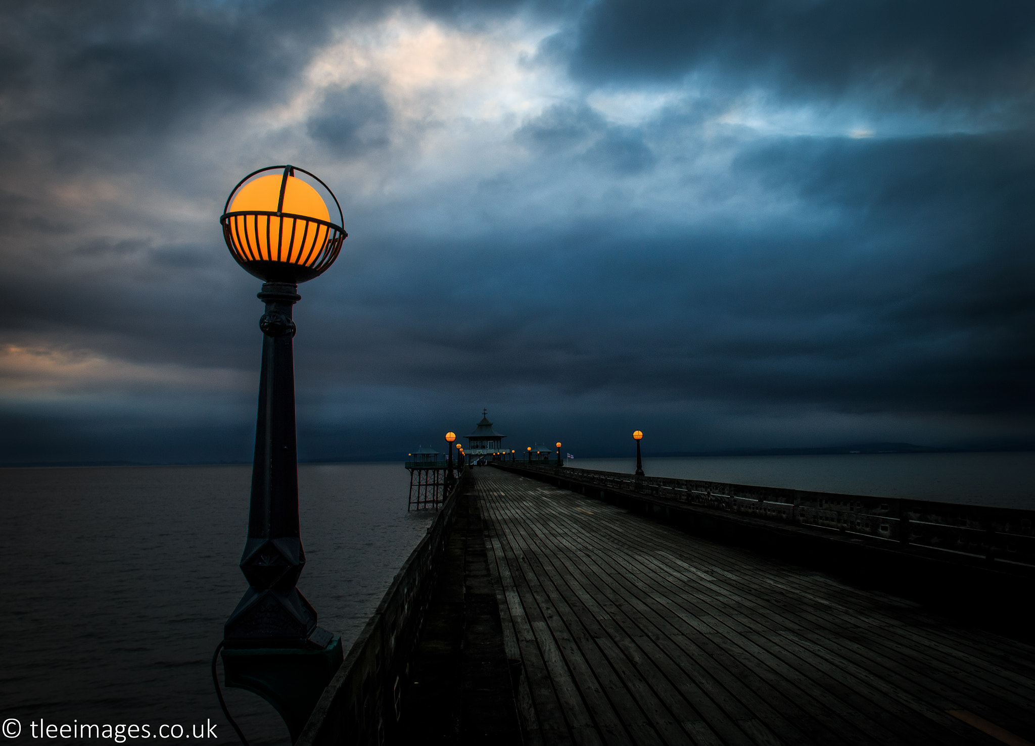 Canon EF 20mm F2.8 USM sample photo. Pier stormy skies photography