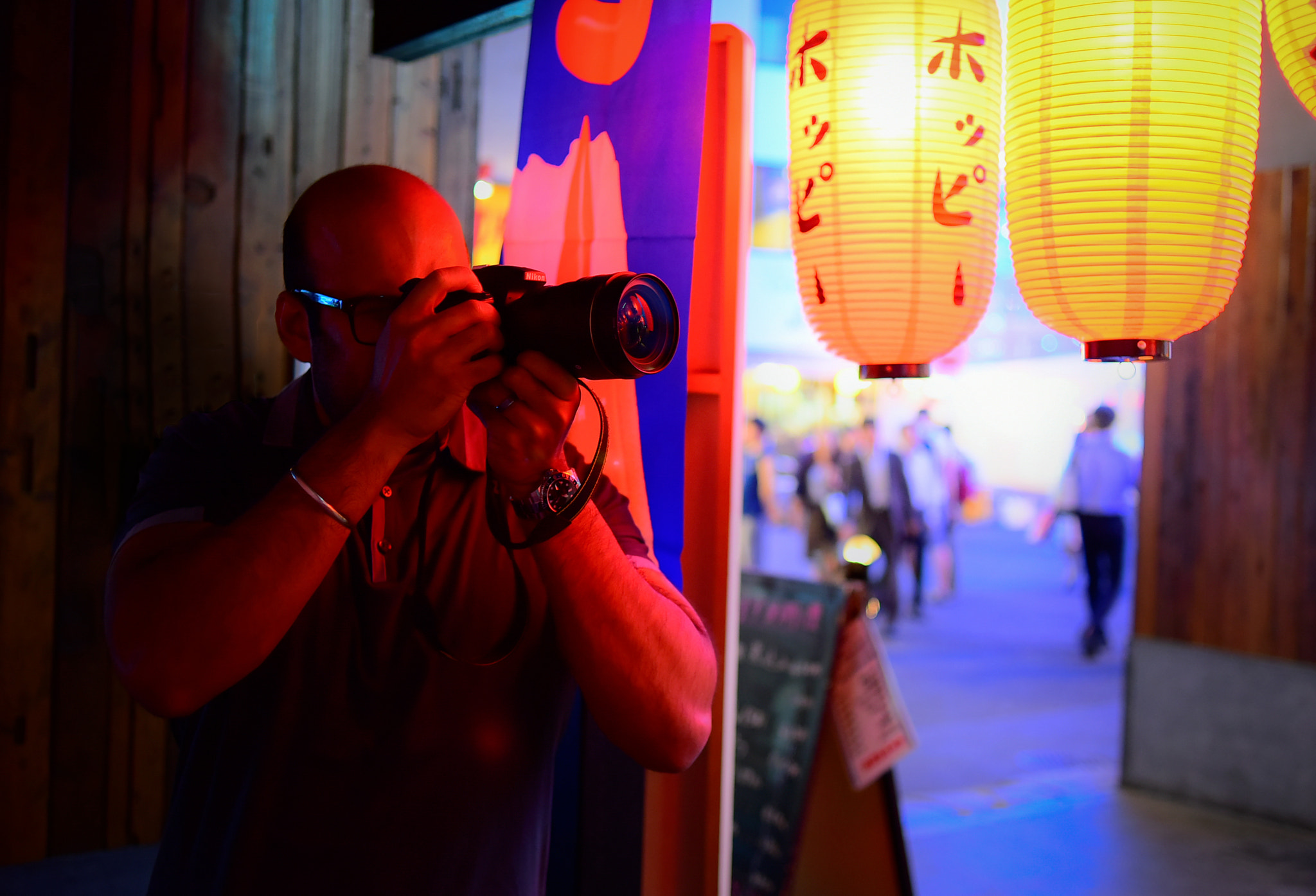 Nikon D810 + Nikon AF Nikkor 35mm F2D sample photo. Street-photographer in action photography
