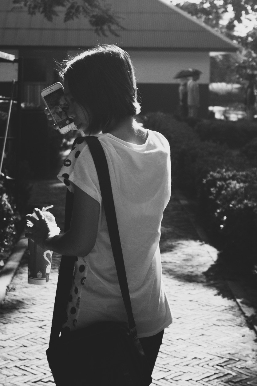 Canon EOS 500D (EOS Rebel T1i / EOS Kiss X3) sample photo. Following an asian woman photography