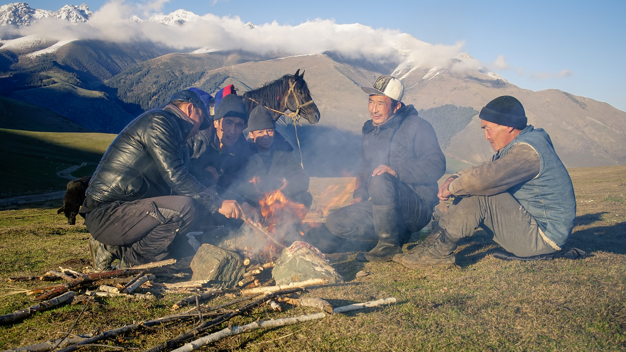 Sony a7R + Sony E PZ 18-200mm F3.5-6.3 OSS sample photo. Shepherds hanging out around the fire photography