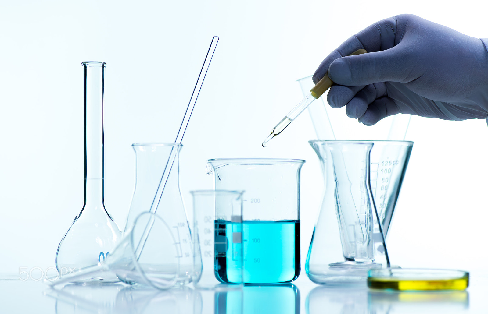 Nikon D4S sample photo. Liquid drop from laboratory glass pipette to test tube photography
