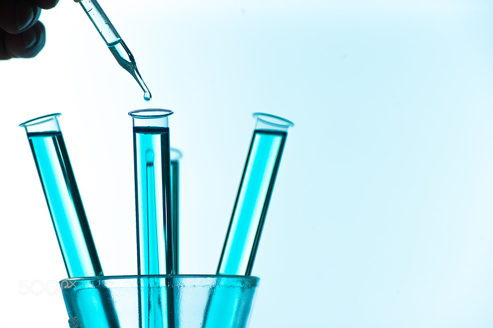 Nikon D4S sample photo. Liquid drop from laboratory glass pipette to test tube photography