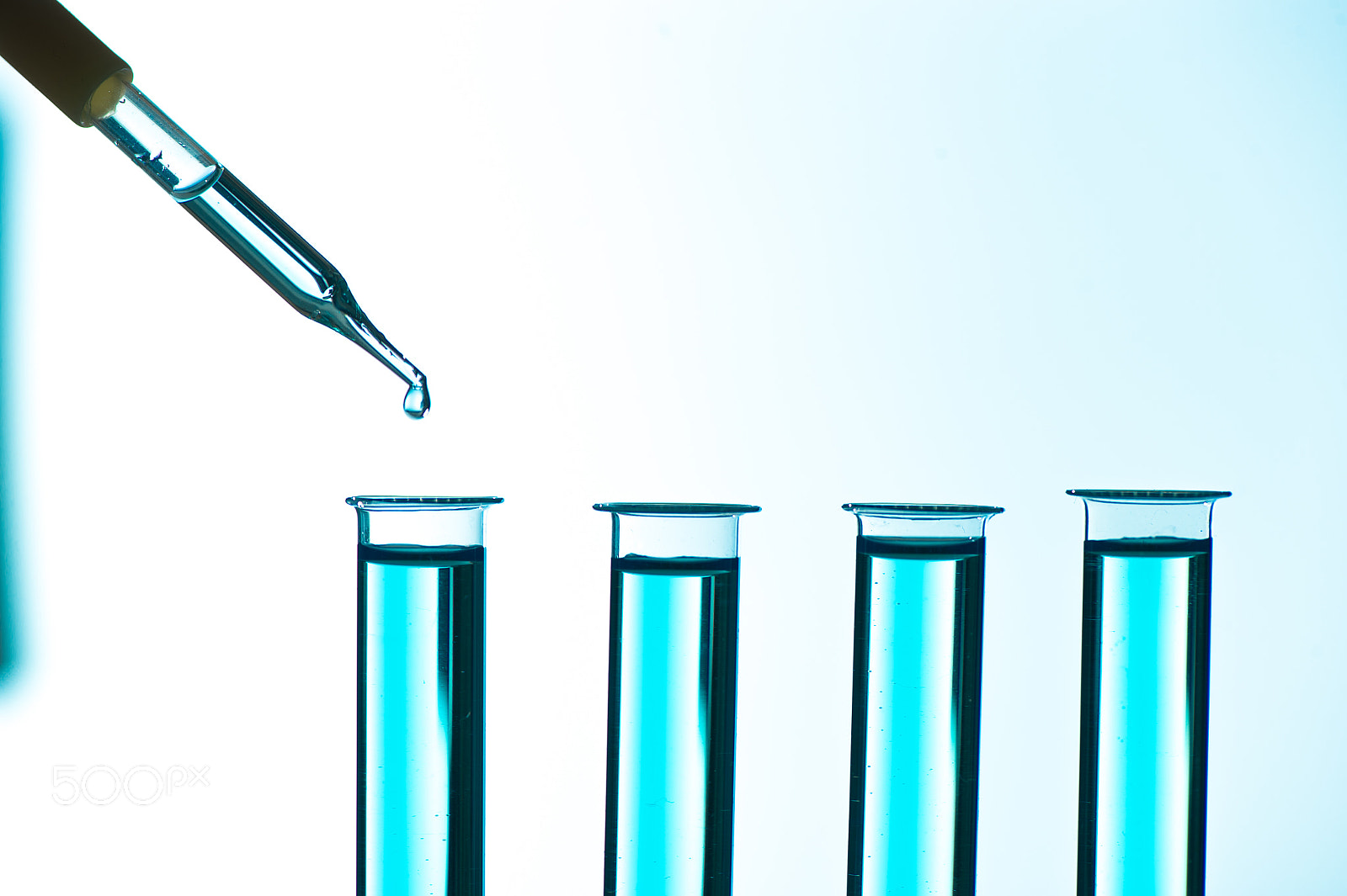 Nikon D4S sample photo. Liquid drop from laboratory glass pipette to test tube photography