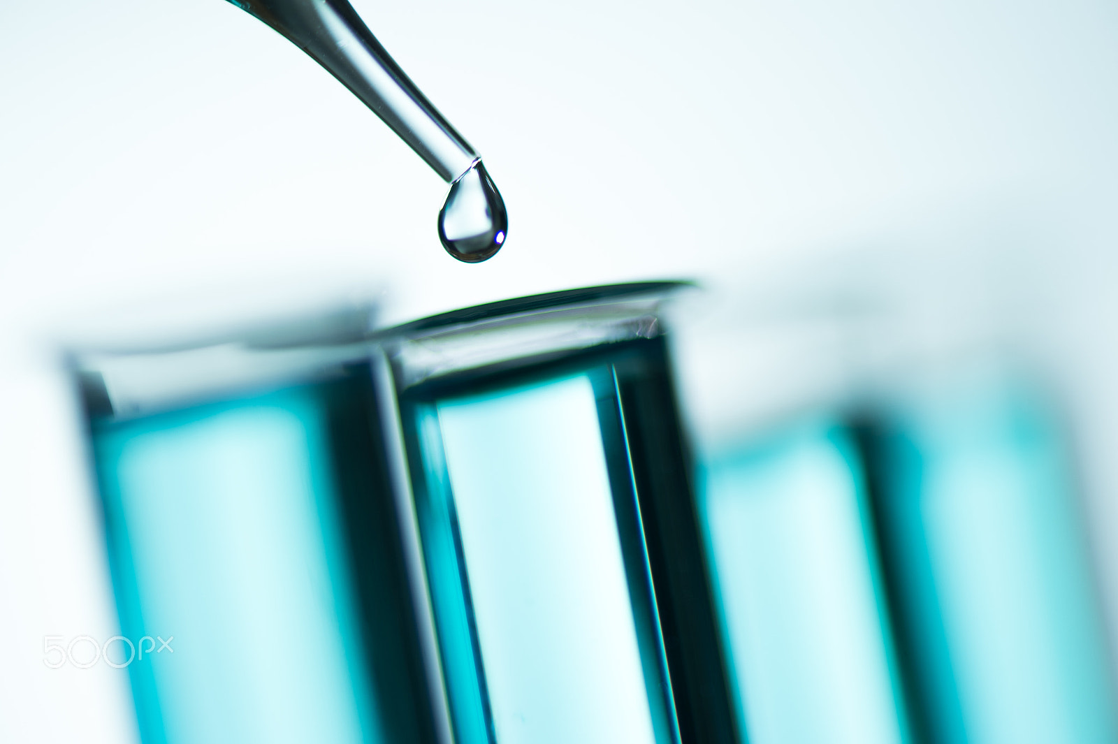 Nikon D4S sample photo. Liquid drop from laboratory glass pipette to test tube photography
