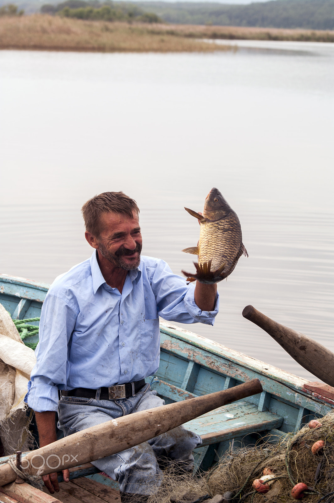 Pentax K20D + Sigma sample photo. Fisherman photography