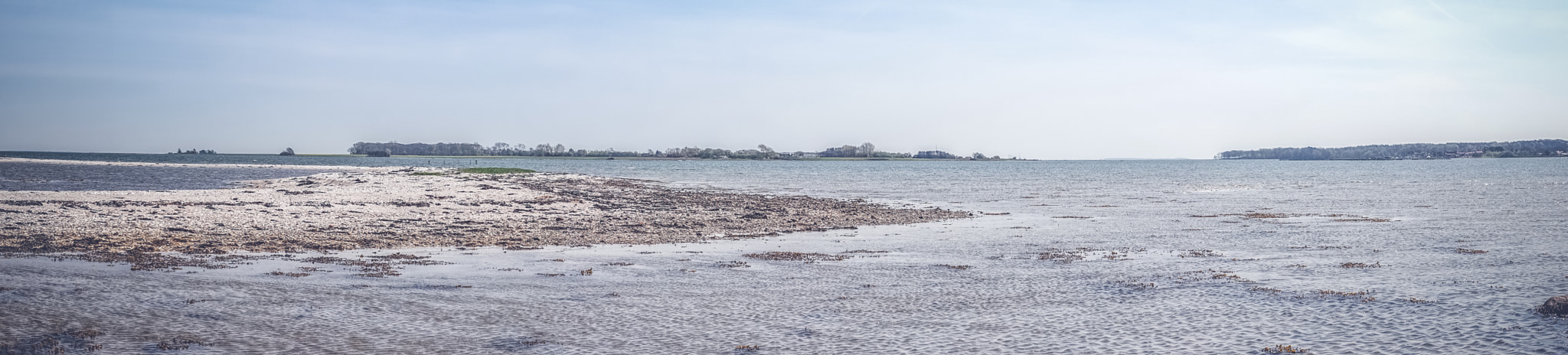 Sony a7R + Minolta AF 50mm F1.4 [New] sample photo. Beach with green fields and blue sky photography