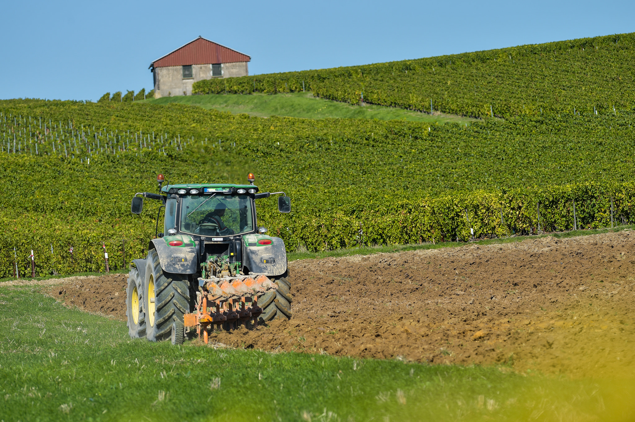 Nikon AF-S Nikkor 300mm F2.8G ED VR II sample photo. Tractor plowing the fields photography