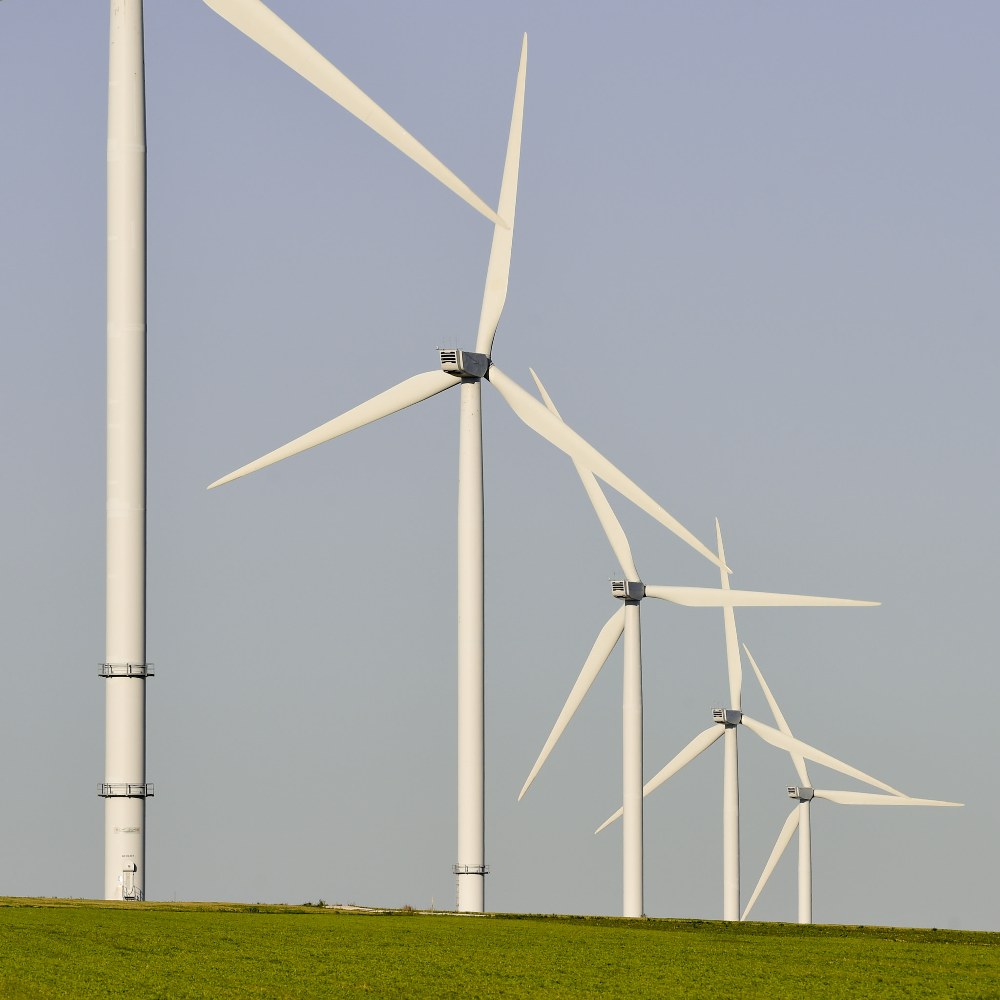 Nikon AF-S Nikkor 300mm F2.8G ED VR II sample photo. Windmills for electric power production on blue sky photography