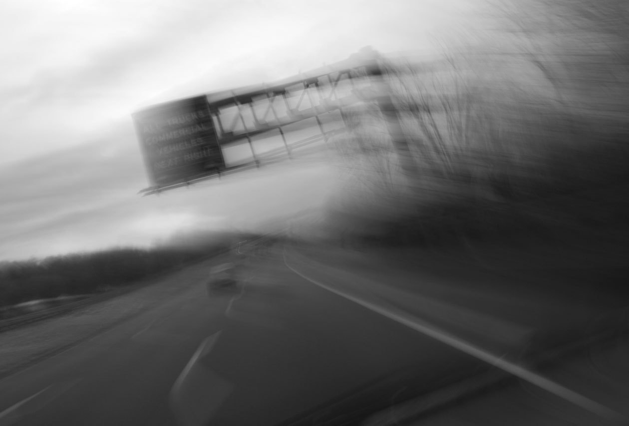 Nikon D40X sample photo. Leaning sign photography