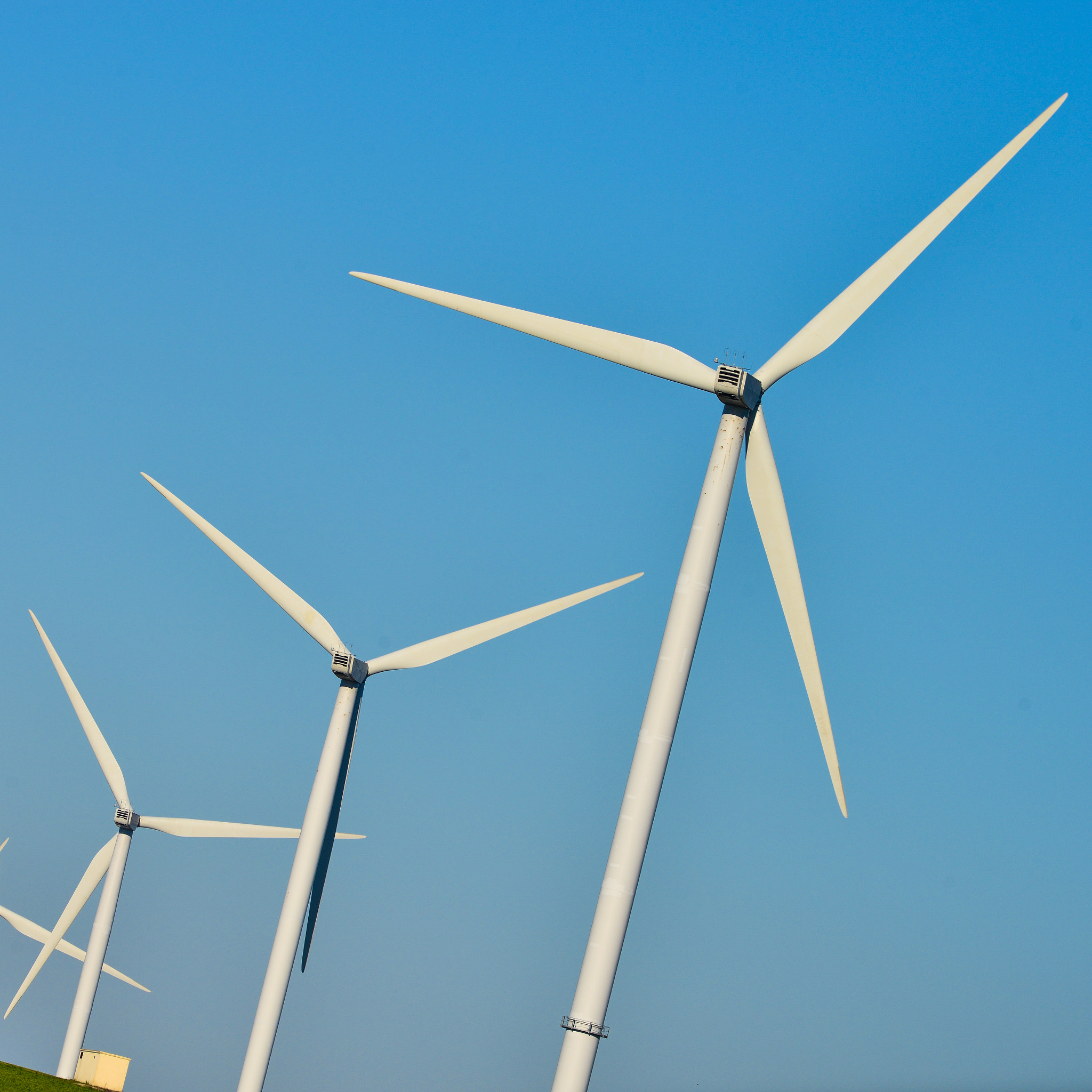 Nikon AF-S Nikkor 300mm F2.8G ED VR II sample photo. Windmills for electric power production on blue sky photography