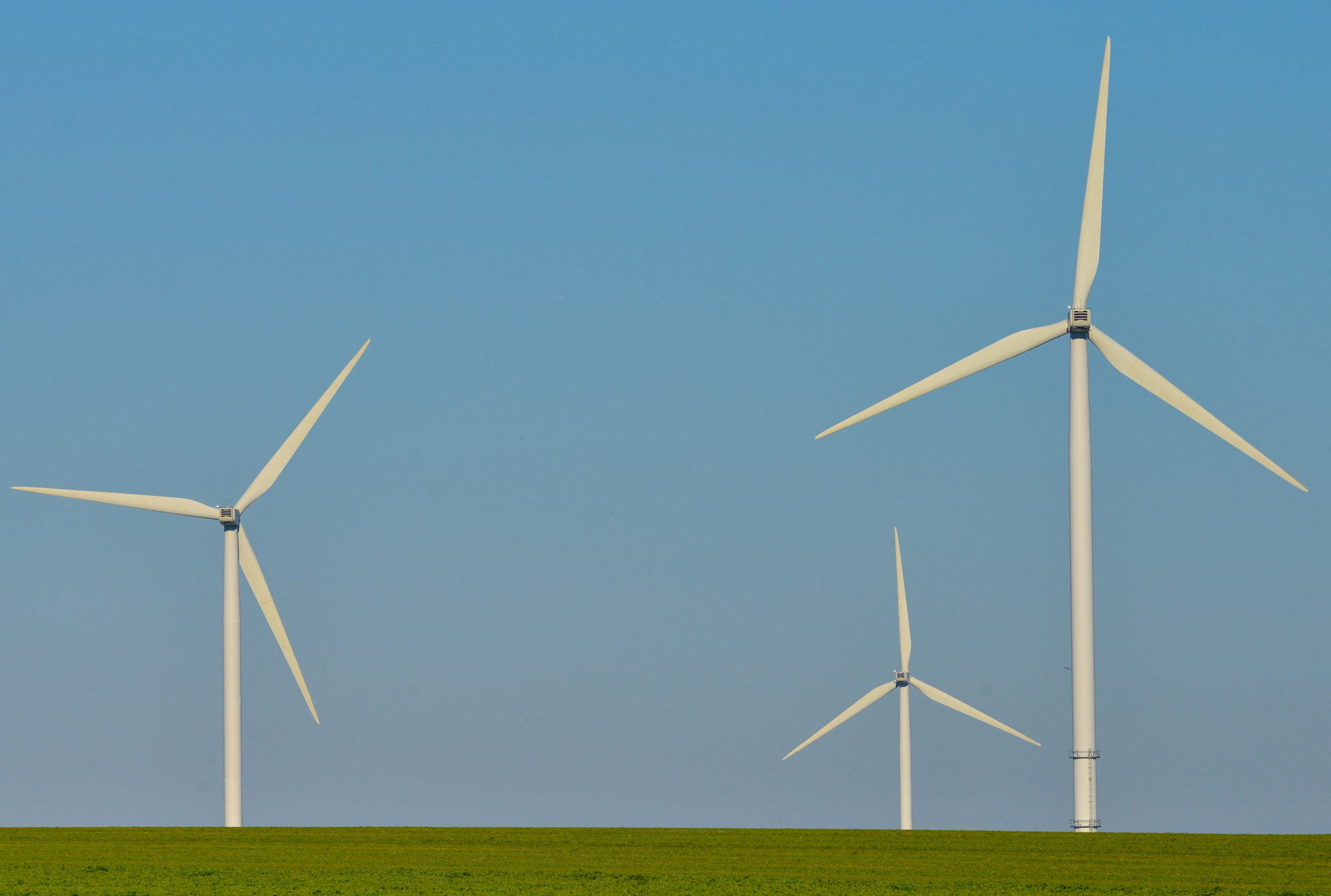 Nikon AF-S Nikkor 300mm F2.8G ED VR II sample photo. Windmills for electric power production on blue sky photography