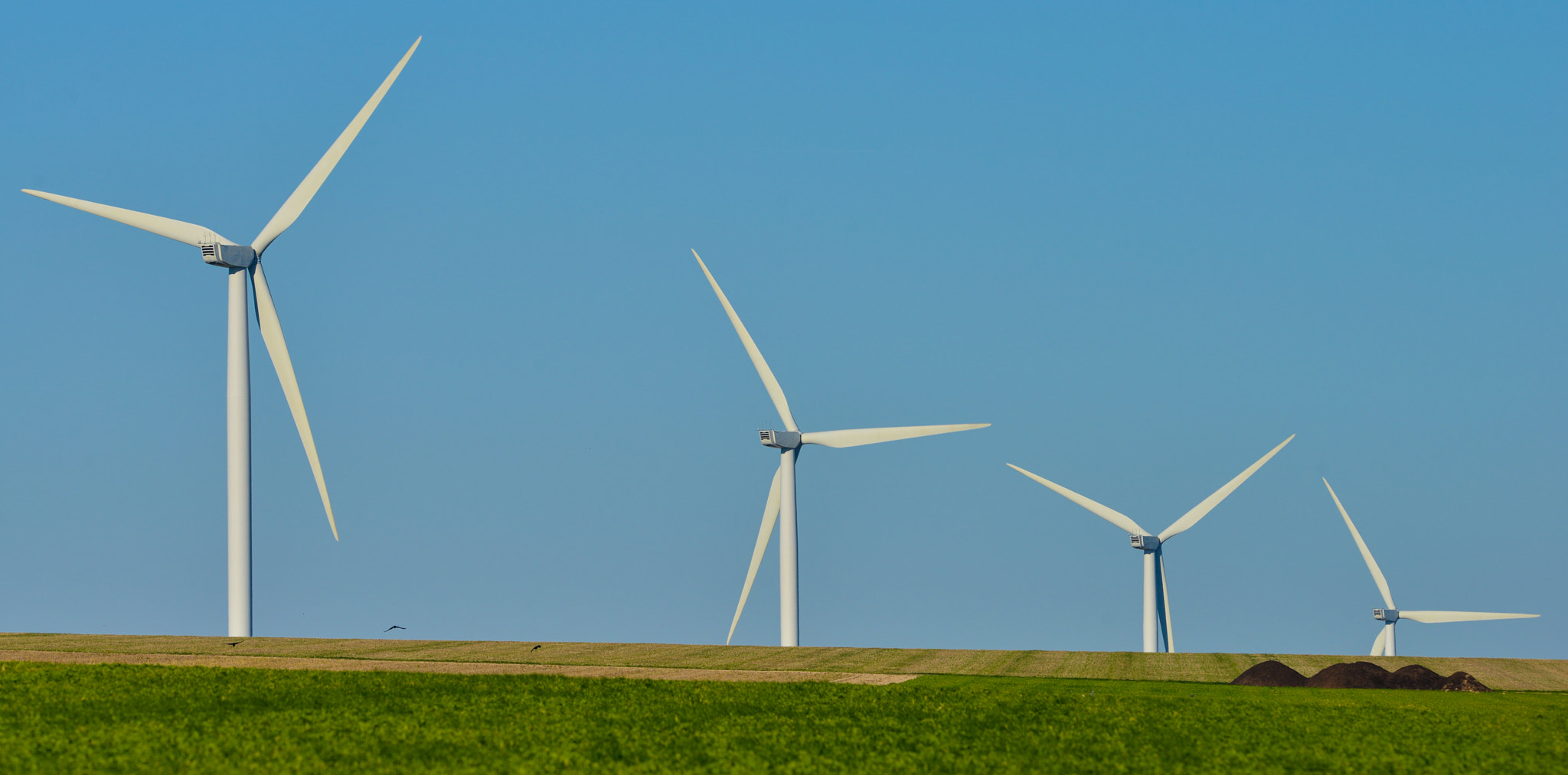 Nikon AF-S Nikkor 300mm F2.8G ED VR II sample photo. Windmills for electric power production on blue sky photography