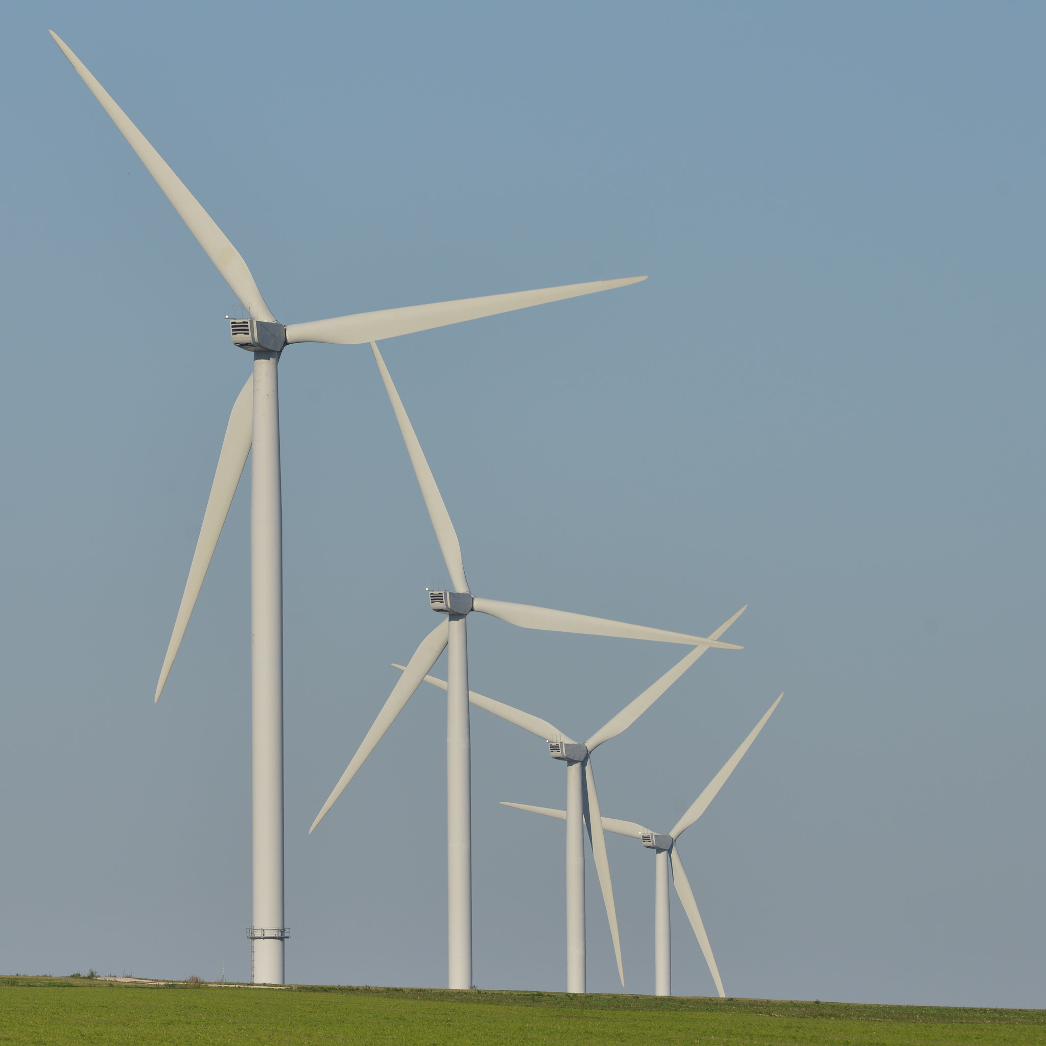 Nikon AF-S Nikkor 300mm F2.8G ED VR II sample photo. Windmills for electric power production on blue sky photography