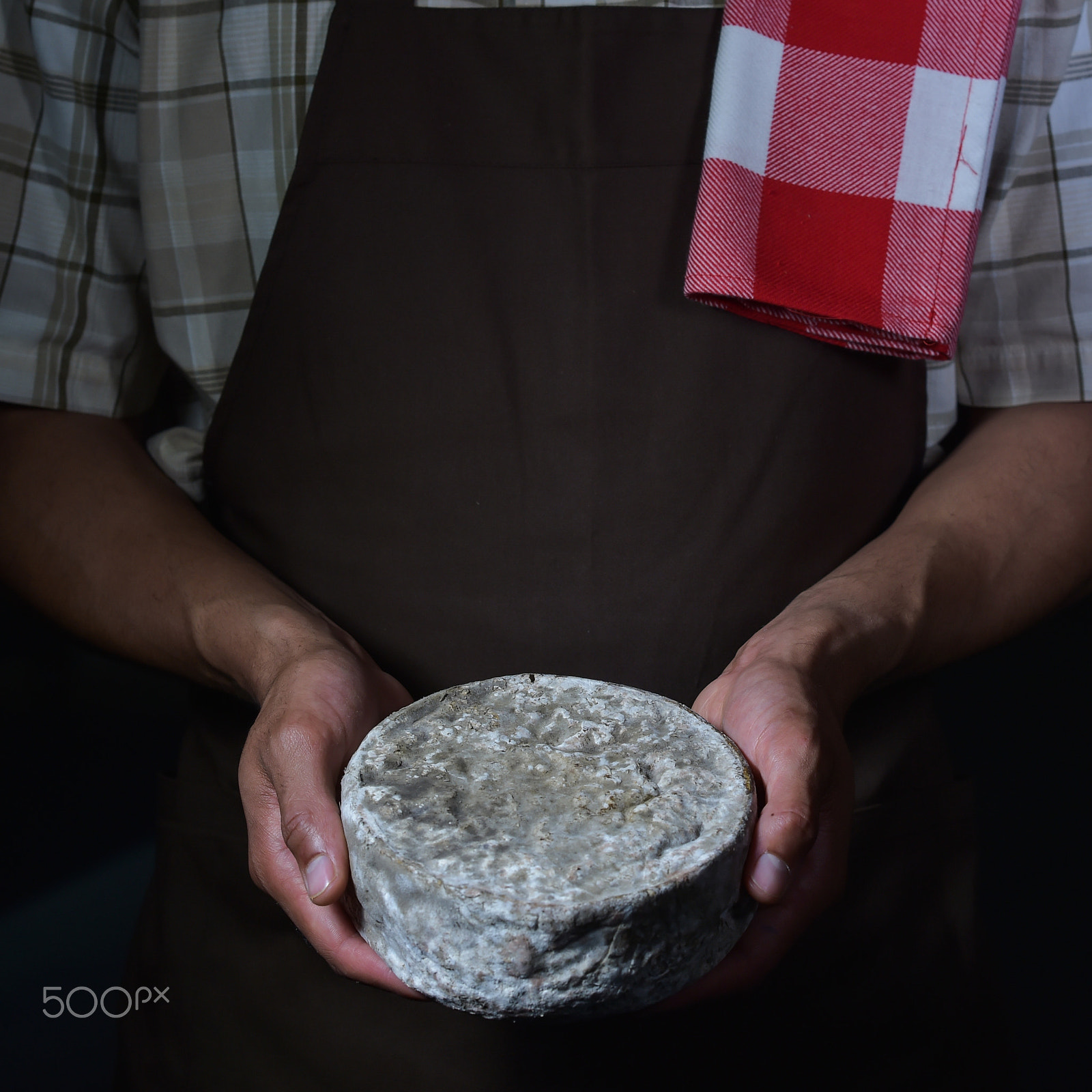 Nikon D4S + Nikon AF-S Nikkor 85mm F1.4G sample photo. French tomme cheese in the hands of a cheesemaker photography