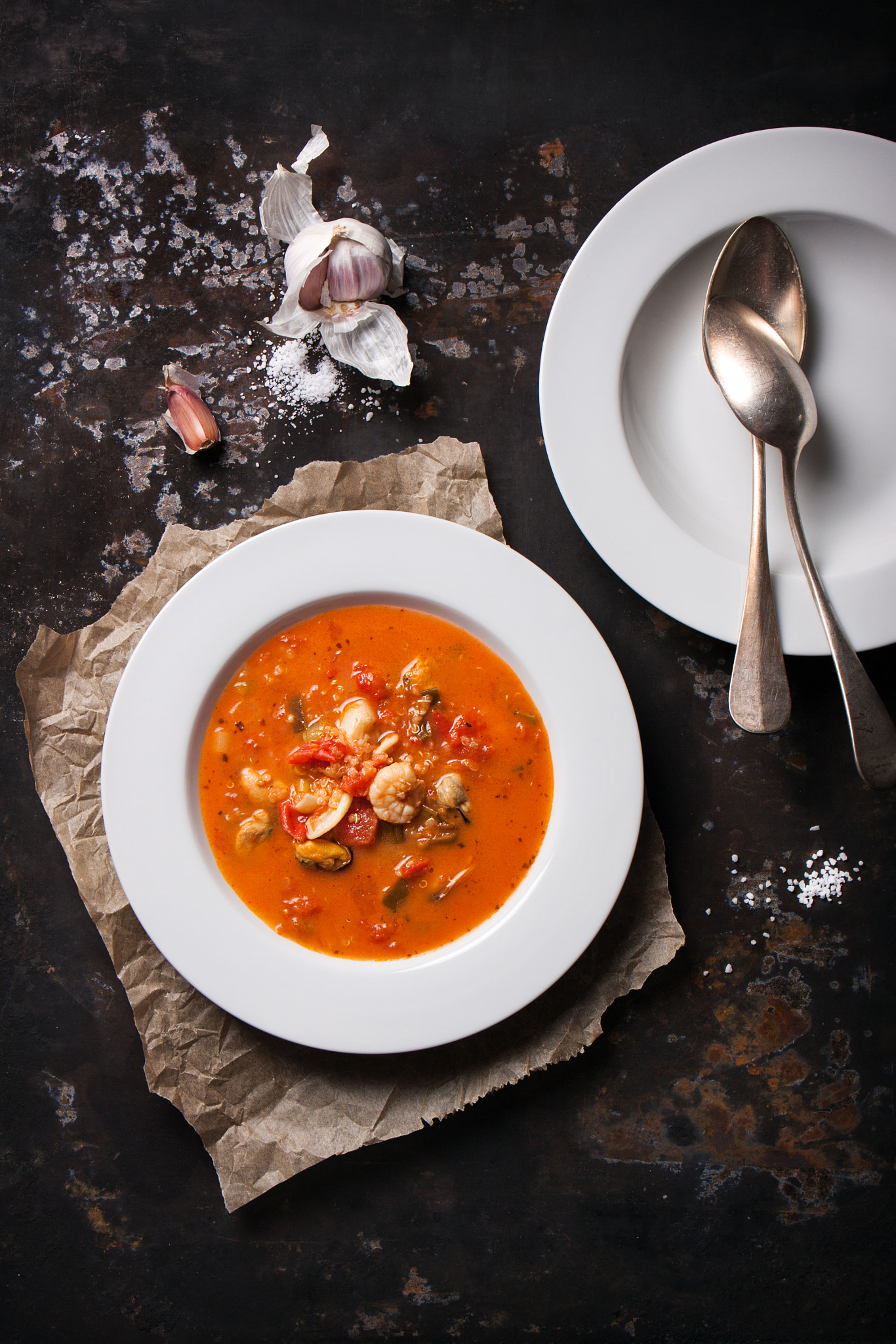 Canon EF 24-70mm F4L IS USM sample photo. Homemade seafood soup with tomato sauce and coconut milk on an old metal tray, top view photography