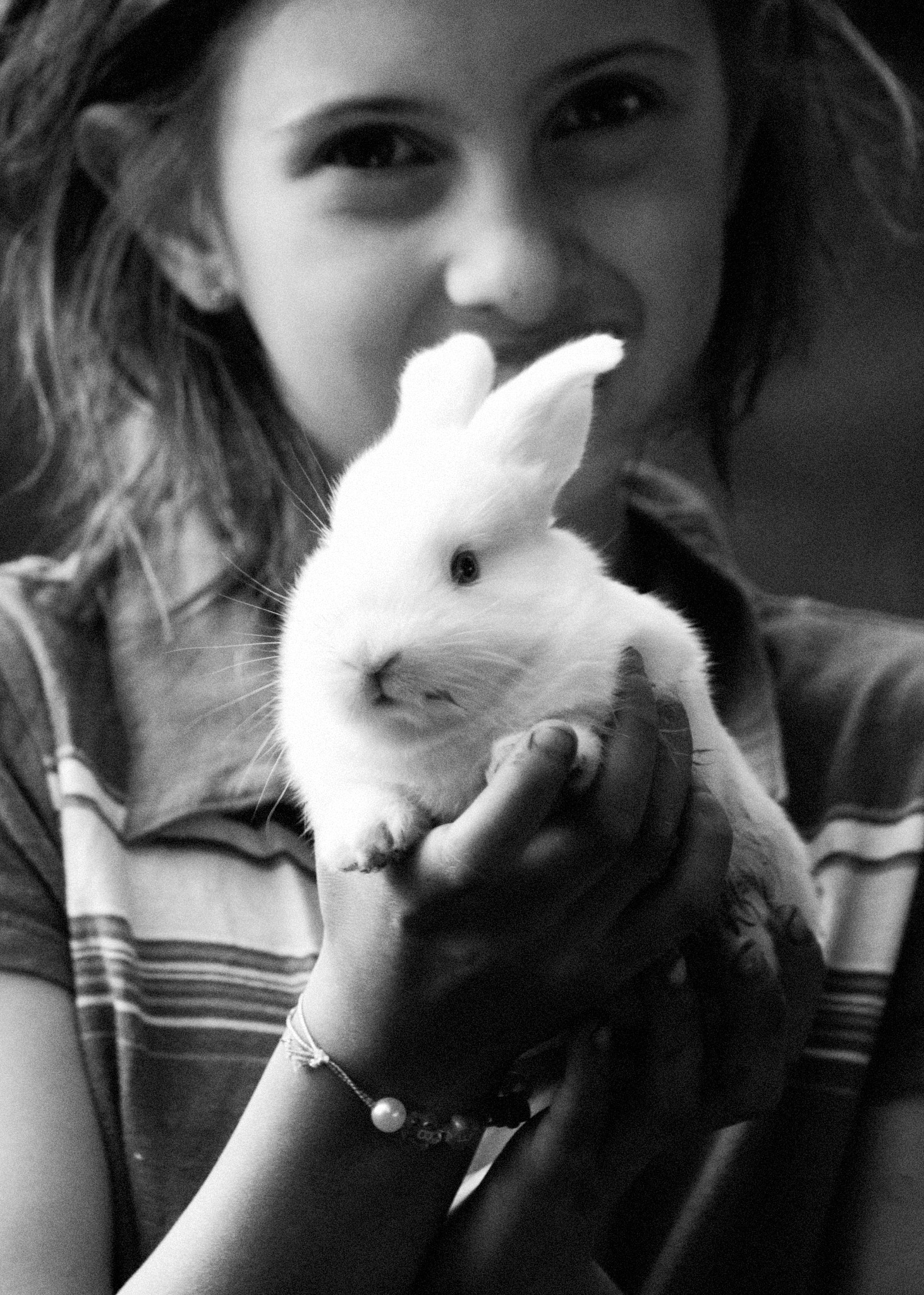 Canon EOS 1000D (EOS Digital Rebel XS / EOS Kiss F) sample photo. Child with white rabbit photography