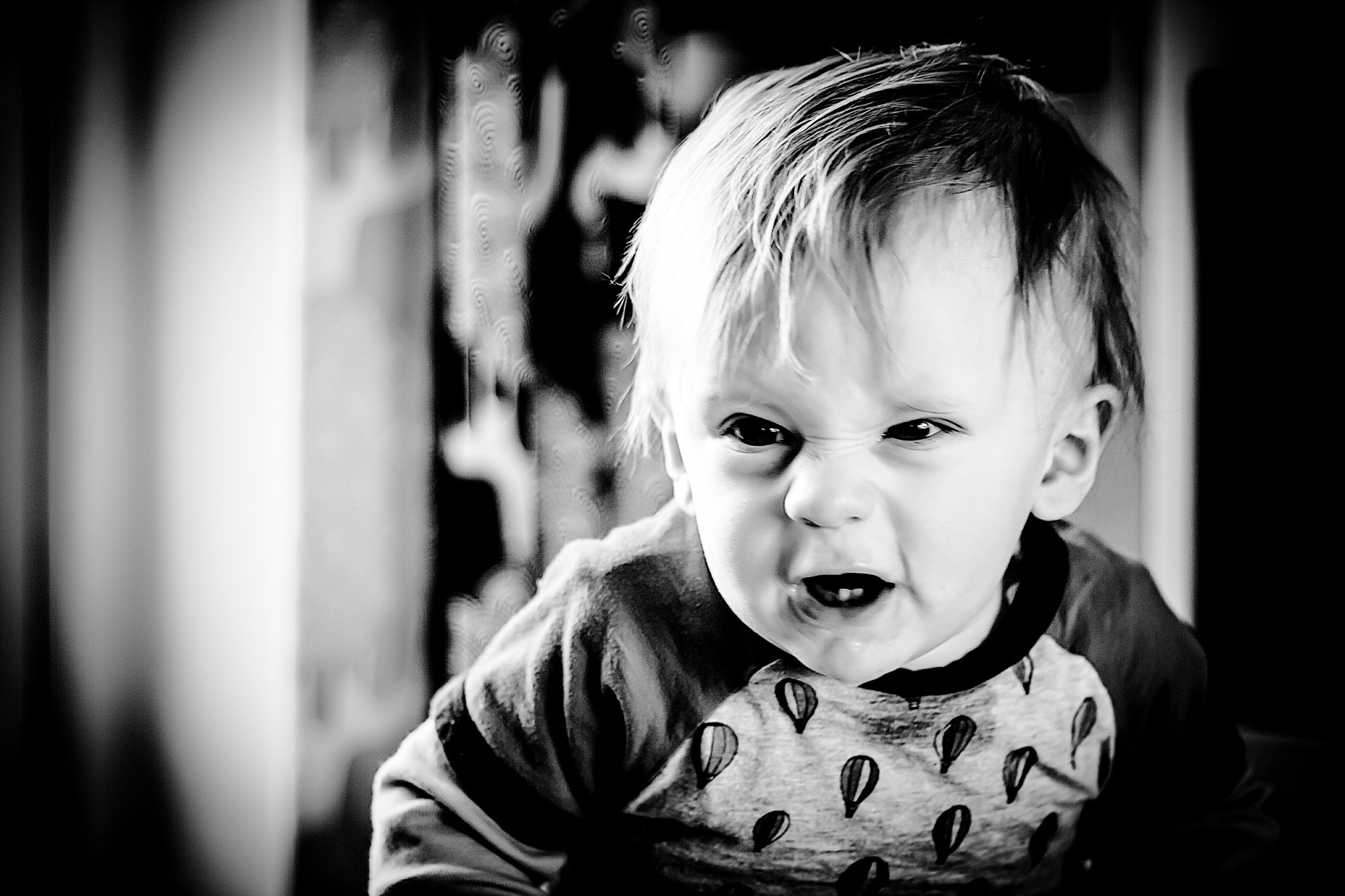 Canon EOS 400D (EOS Digital Rebel XTi / EOS Kiss Digital X) + Canon EF 50mm F1.8 II sample photo. My little man doing his chucky impression haha! photography