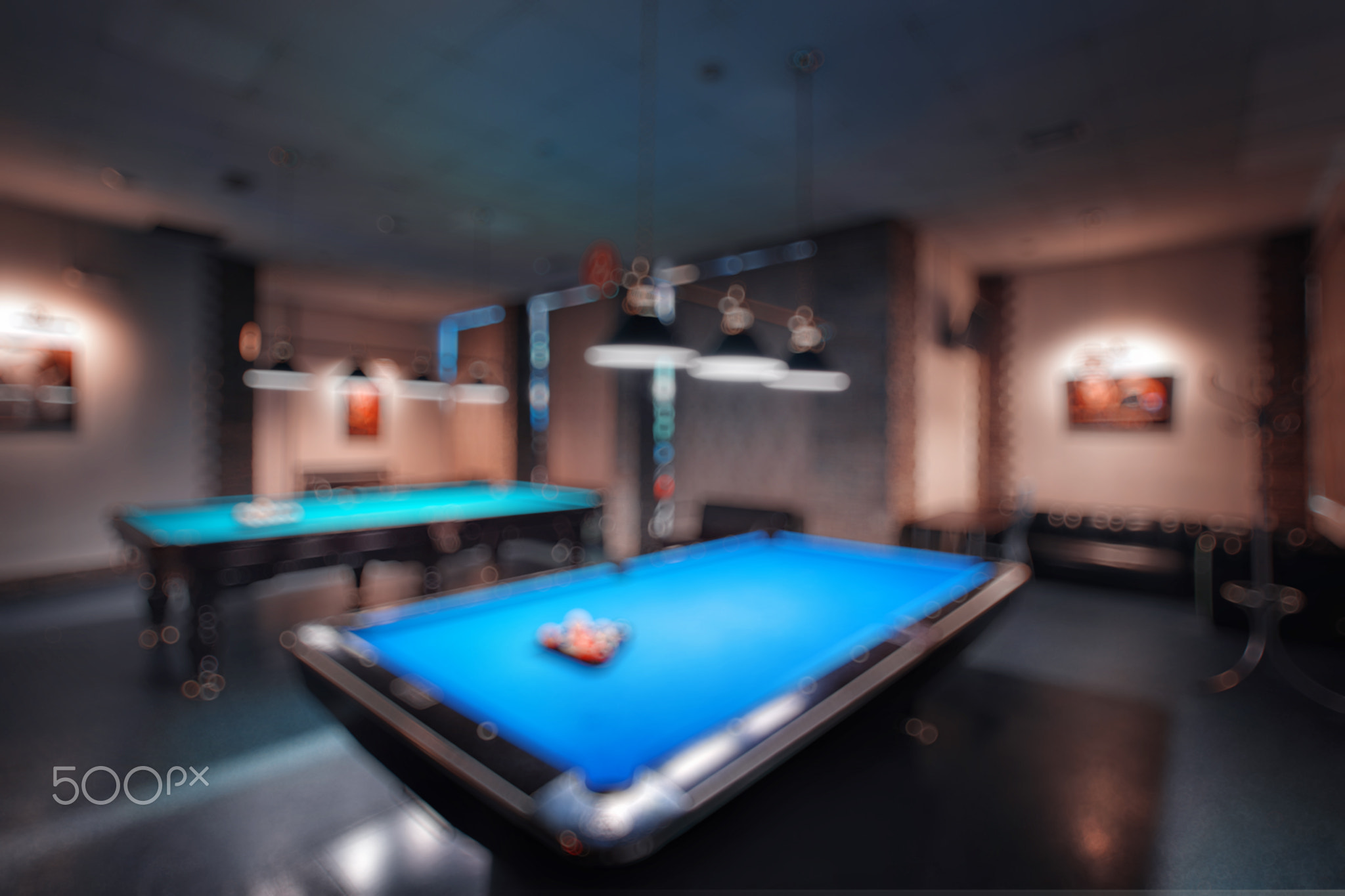 abstract blur. brand new and modern billiard interior in night time