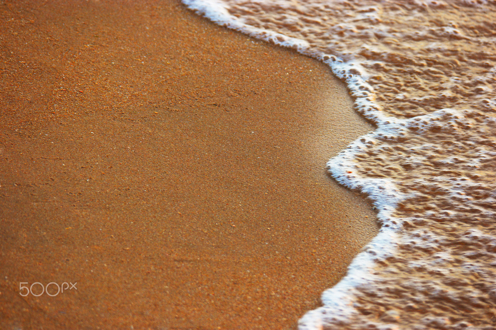 Samsung NX500 + NX 50-200mm F4-5.6 sample photo. Perfect sand surface and wave of sea covered with foam, copyspace photography