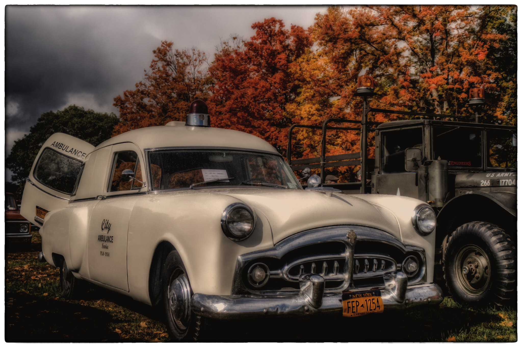 KONICA MINOLTA MAXXUM 7D sample photo. Ambulance in autumn photography